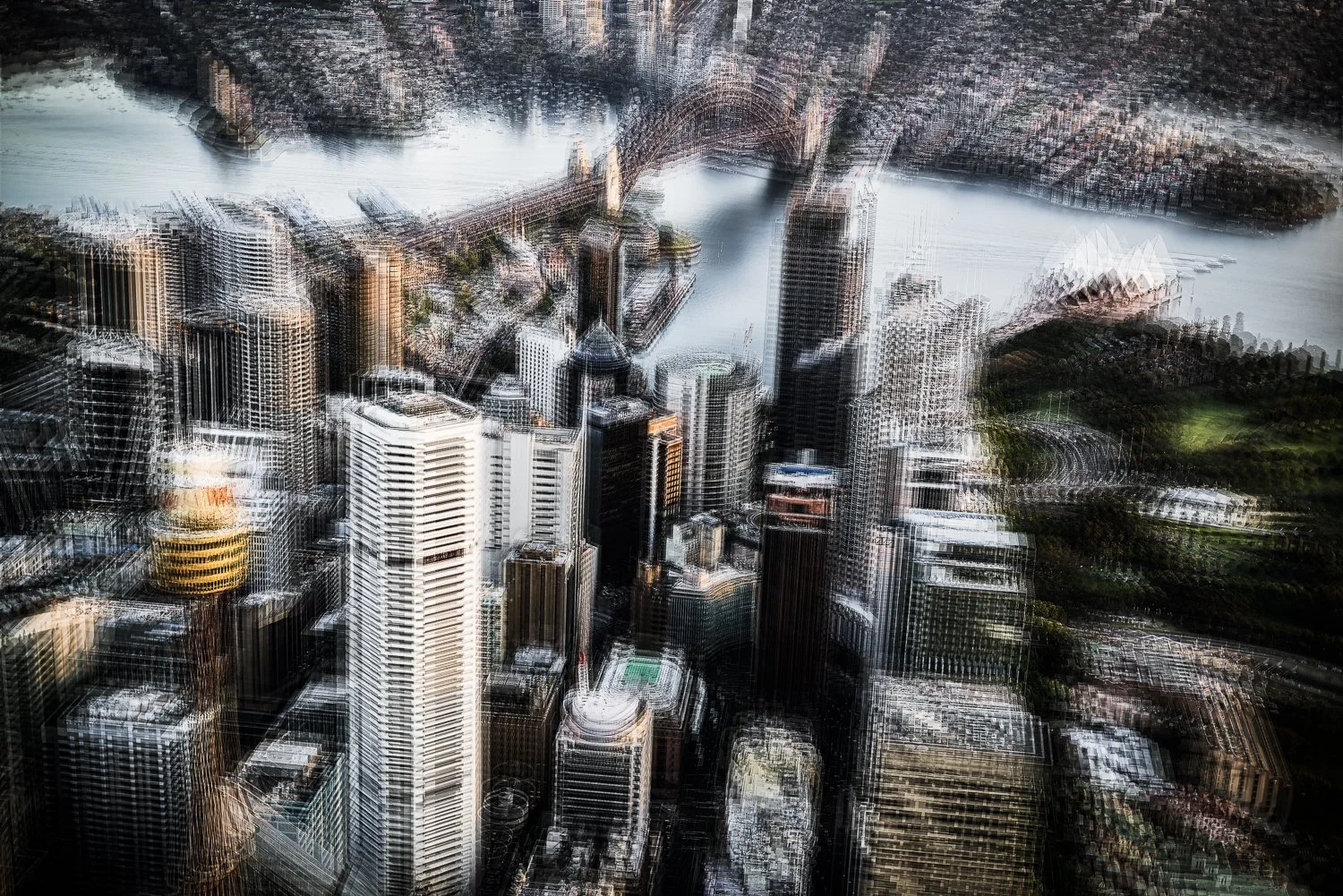 Aerial view of a cityscape with numerous high-rise buildings, a river, and a bridge, enhanced with a digital glitch effect.