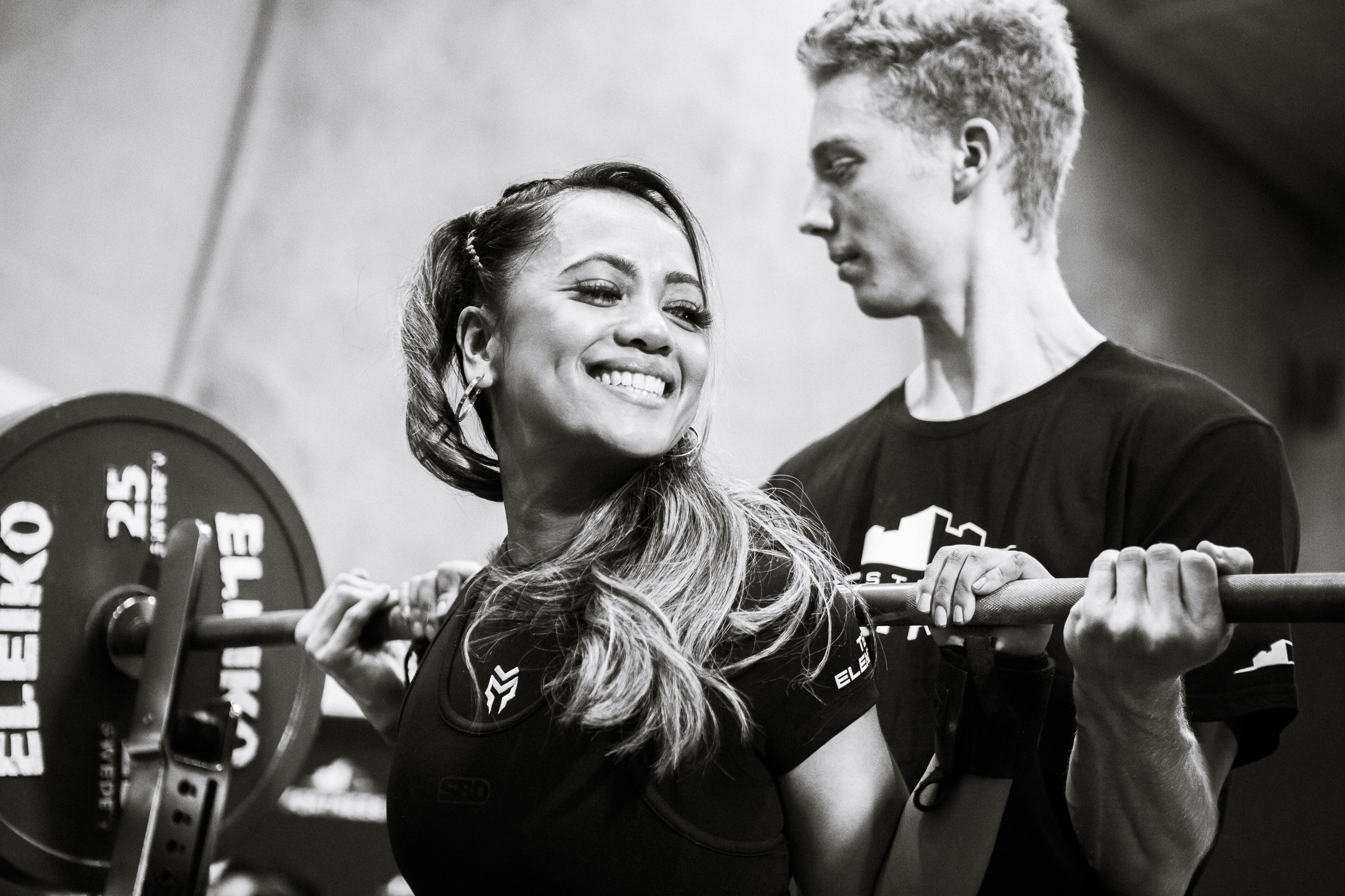 A lifter smiles after a successful squat at TSF Team Champs 2024