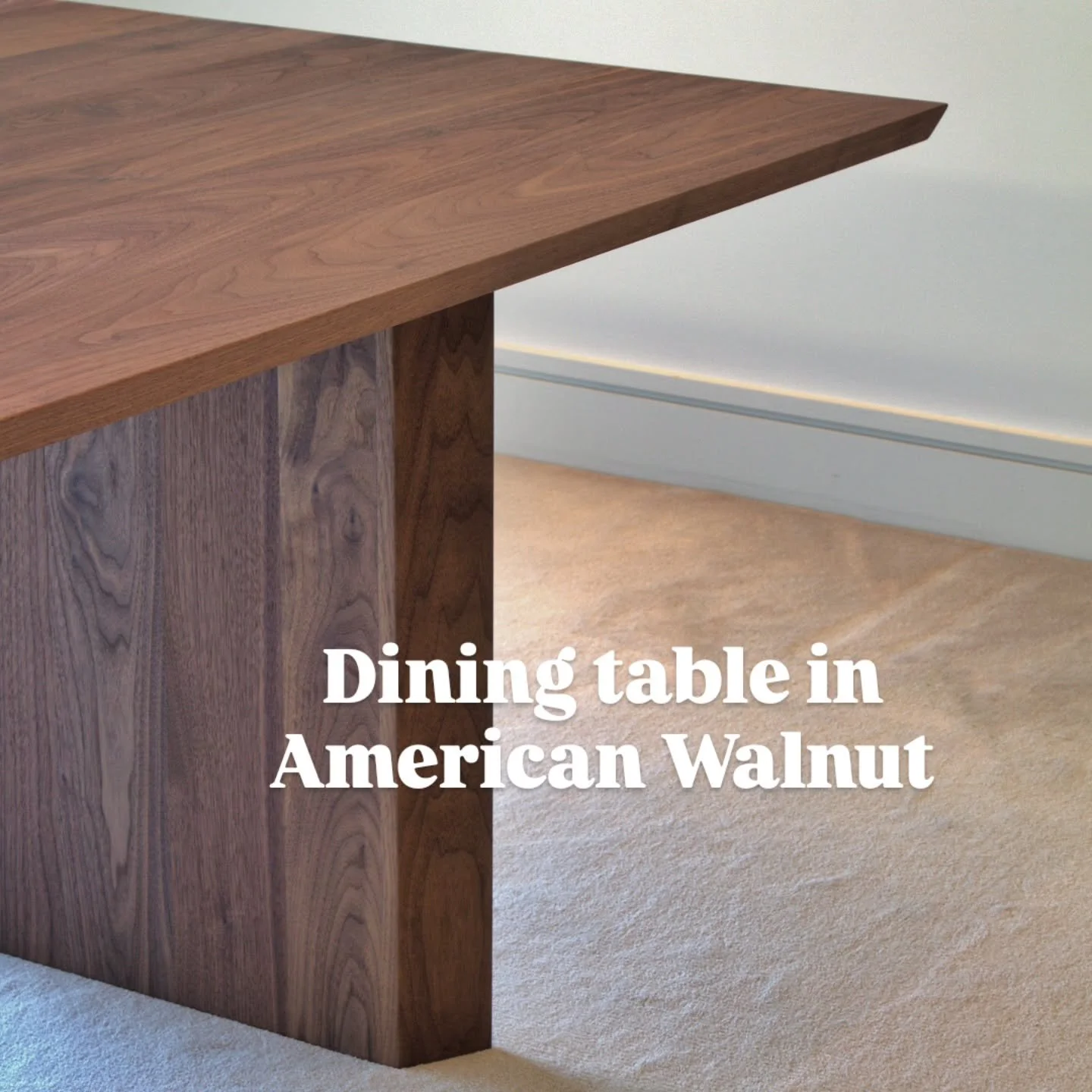 Recently delivered this dining table commission in American Walnut. 

The design is sleek and minimalistic with angled faces on the pedestal legs and the table edge. The legs are attached to the top with hidden brackets allowing a clean appearance fr
