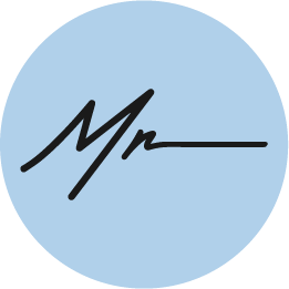 Light blue circular background with a black cursive signature-style 'Mr' in the center.