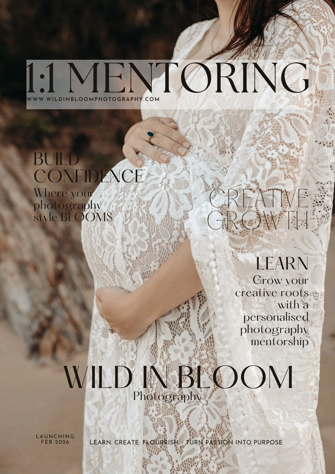Close-up of a pregnant woman wearing a white lace dress, cradling her belly with one hand, outdoors with a blurred natural background.