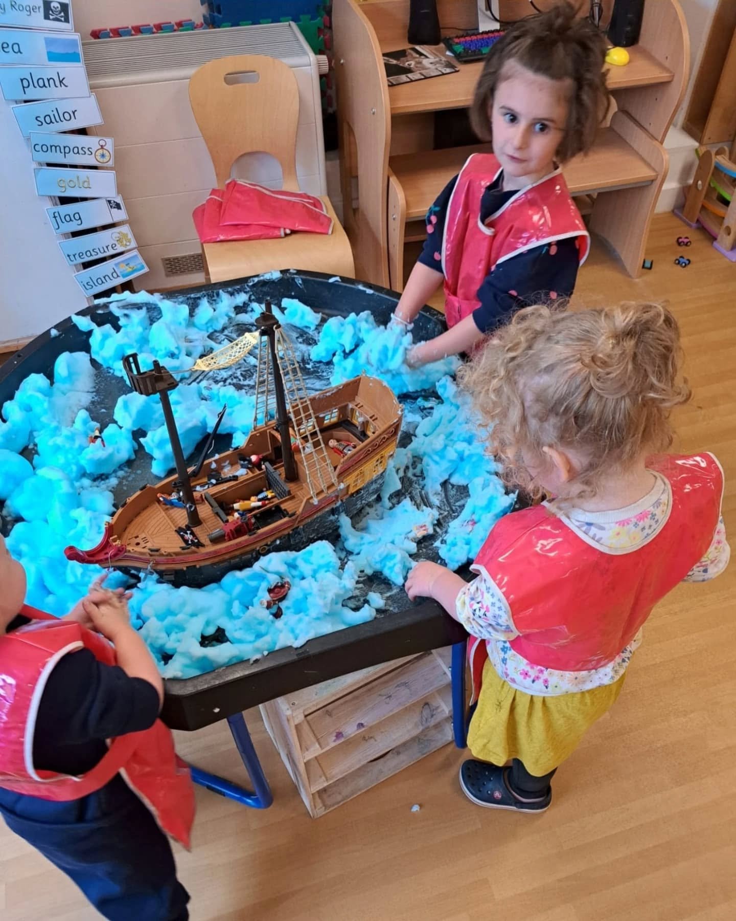 Ahoy there, little pirates! 🏴&zwj;☠️🦜 This term at Oasis Nursery, we&rsquo;re diving into the world of Fantasy &amp; Fiction, and our pirate ship has landed in a sea of sensory play! 🌊⚓️ From making pirate hats to hunting for treasure, our childre