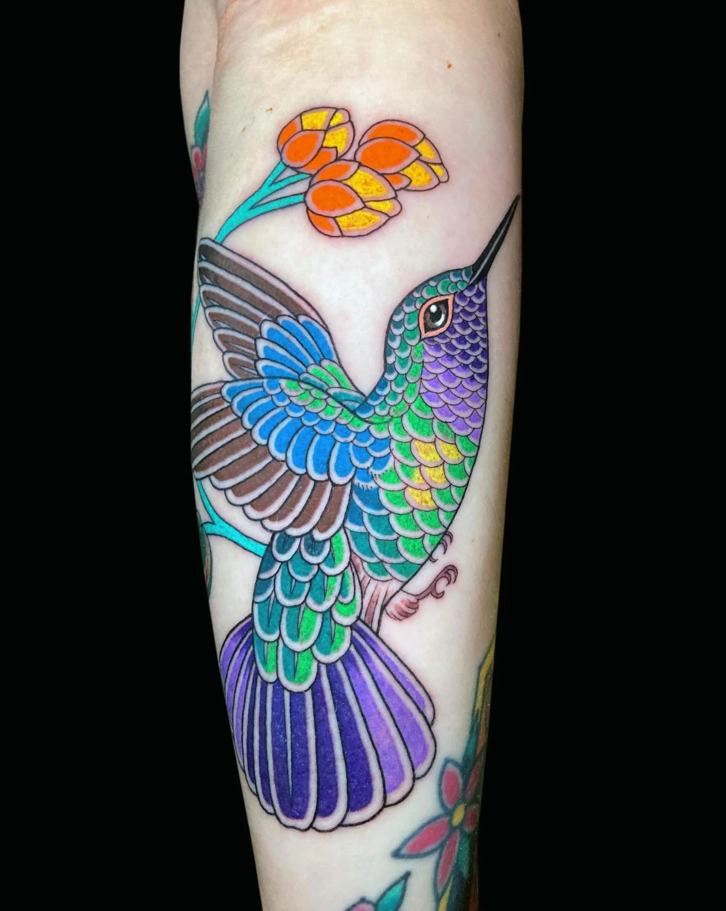 Hummingbird from my flash for Nikki 💜
We are filling some gaps in her sleeve in between existing tattoos, got a few more coming! 🌈 
Thank you Nikki, already looking forward to the next one 🙌🏻. 
Done @magic.tattooing ✨ 

For info and booking pleas