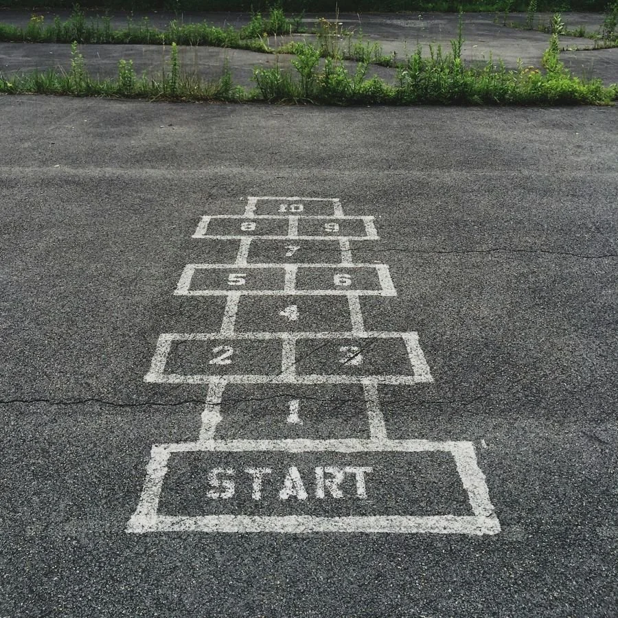 Numbering start line on concrete, trees in background
