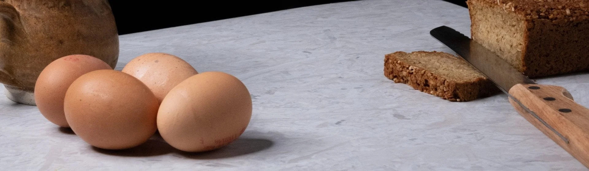 Quartz-Terrazzo-Silver-Strand-Board-Close-Up-Bread-and-Eggs-scaled.jpg