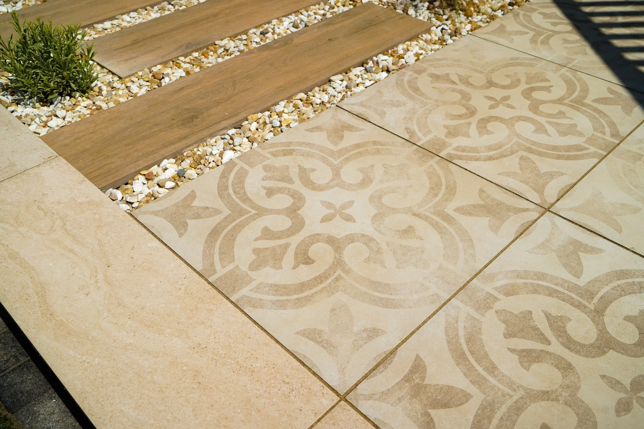 Intricate stone pathway leading to a secluded garden retreat.