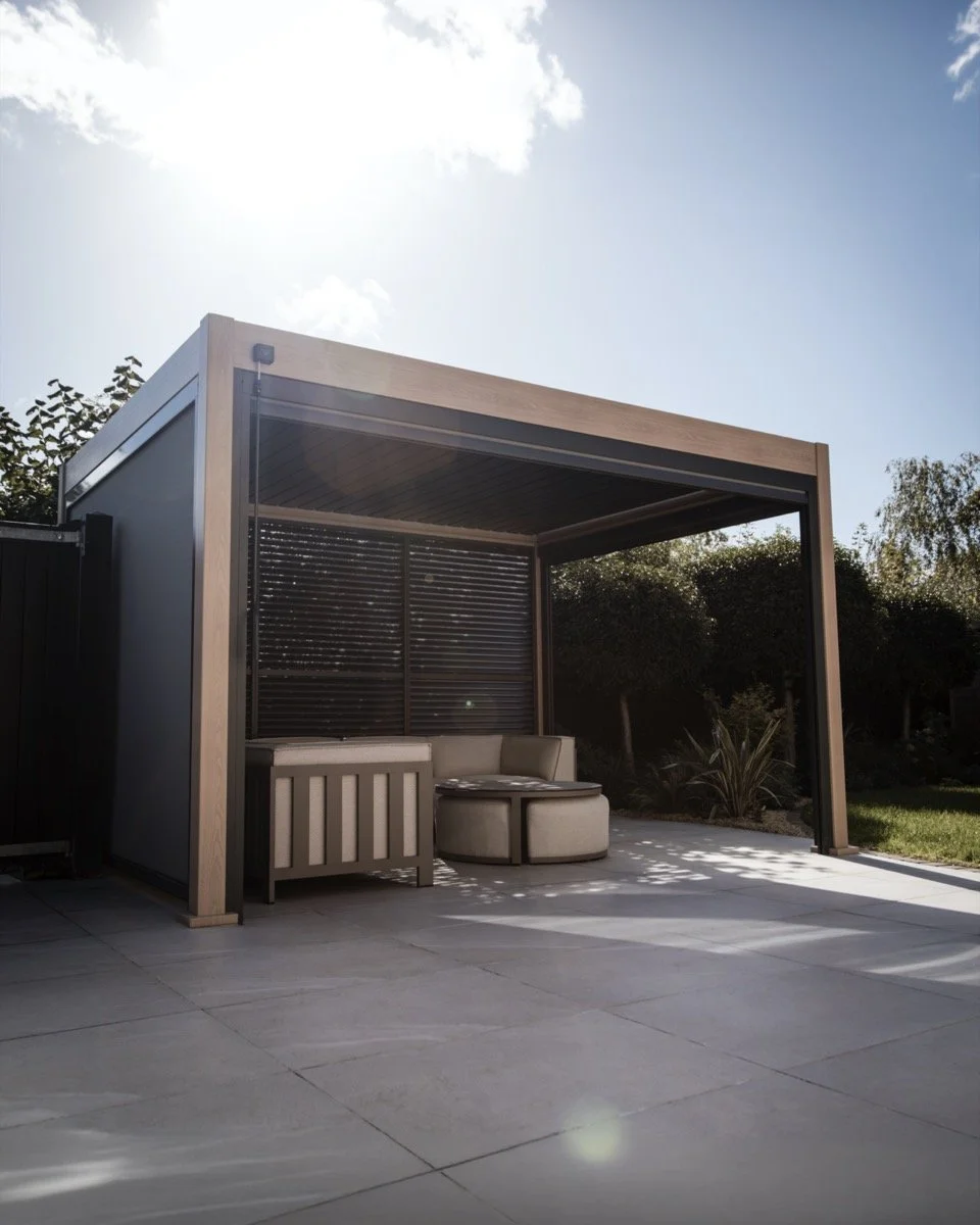 Contemporary garden pergola with stylish outdoor seating and premium patio paving.