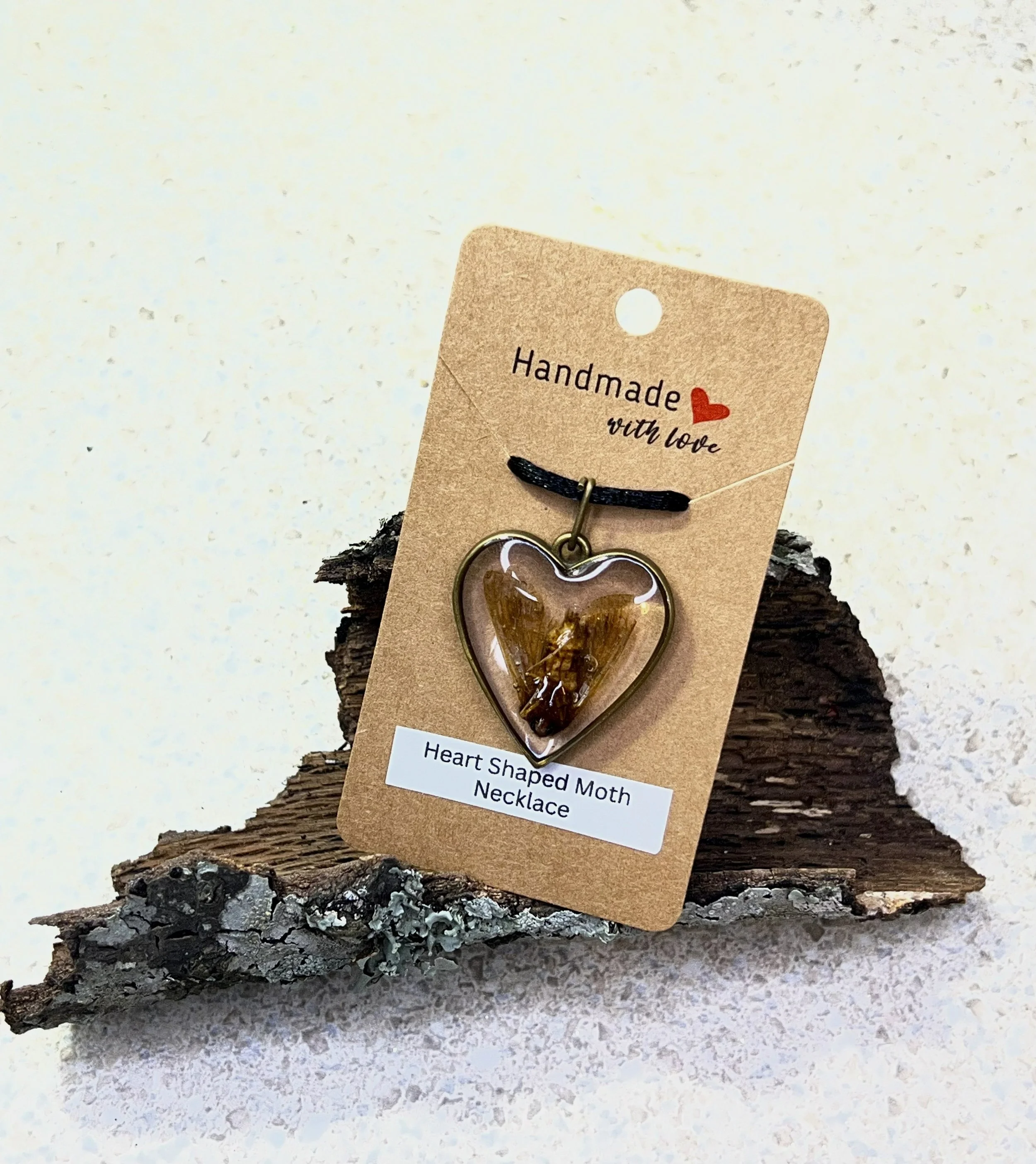 Heart Shaped Moth Pendant