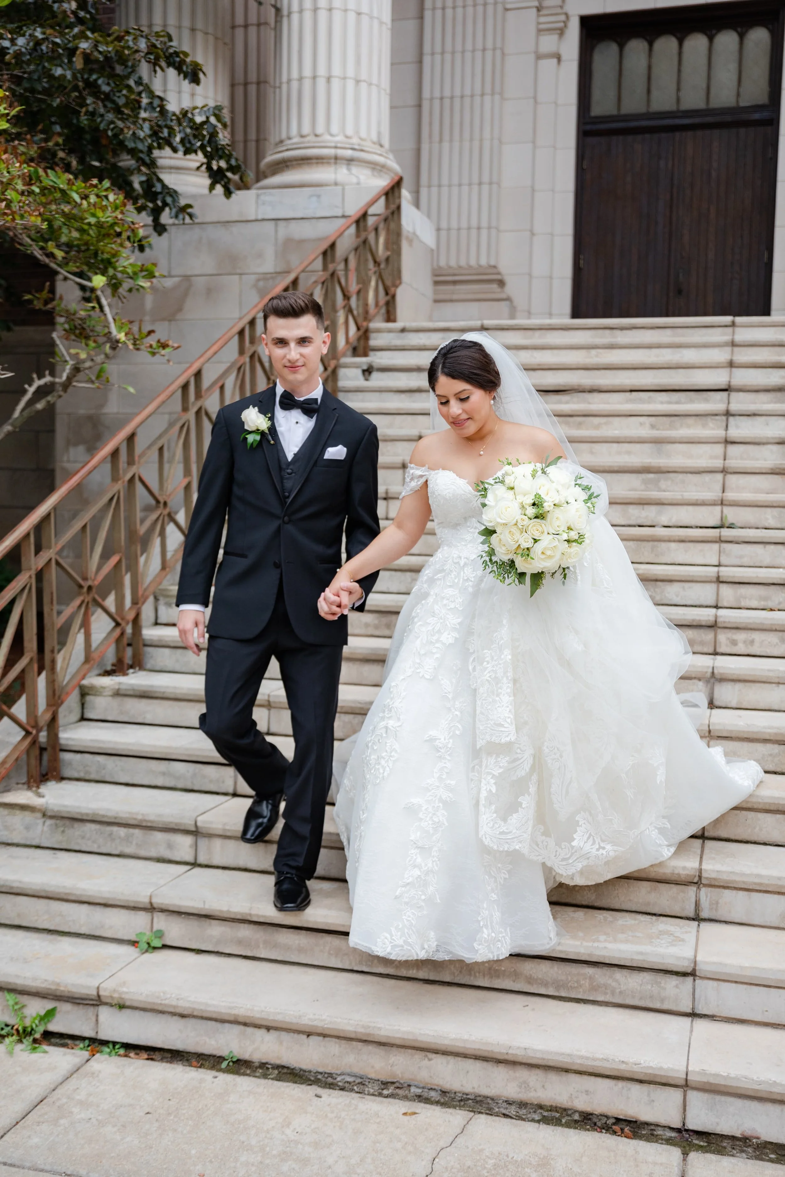 bride-and-groom-walking-down-steps.jpg
