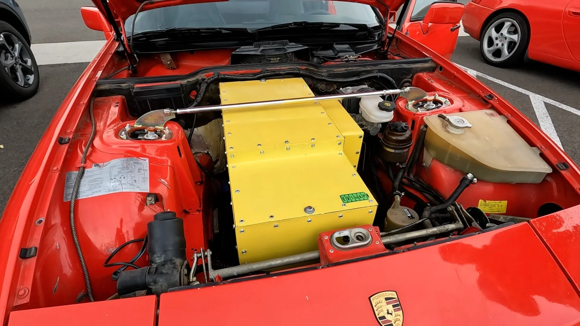 Red porsche 924 converted to EV with a Nissan Leaf system