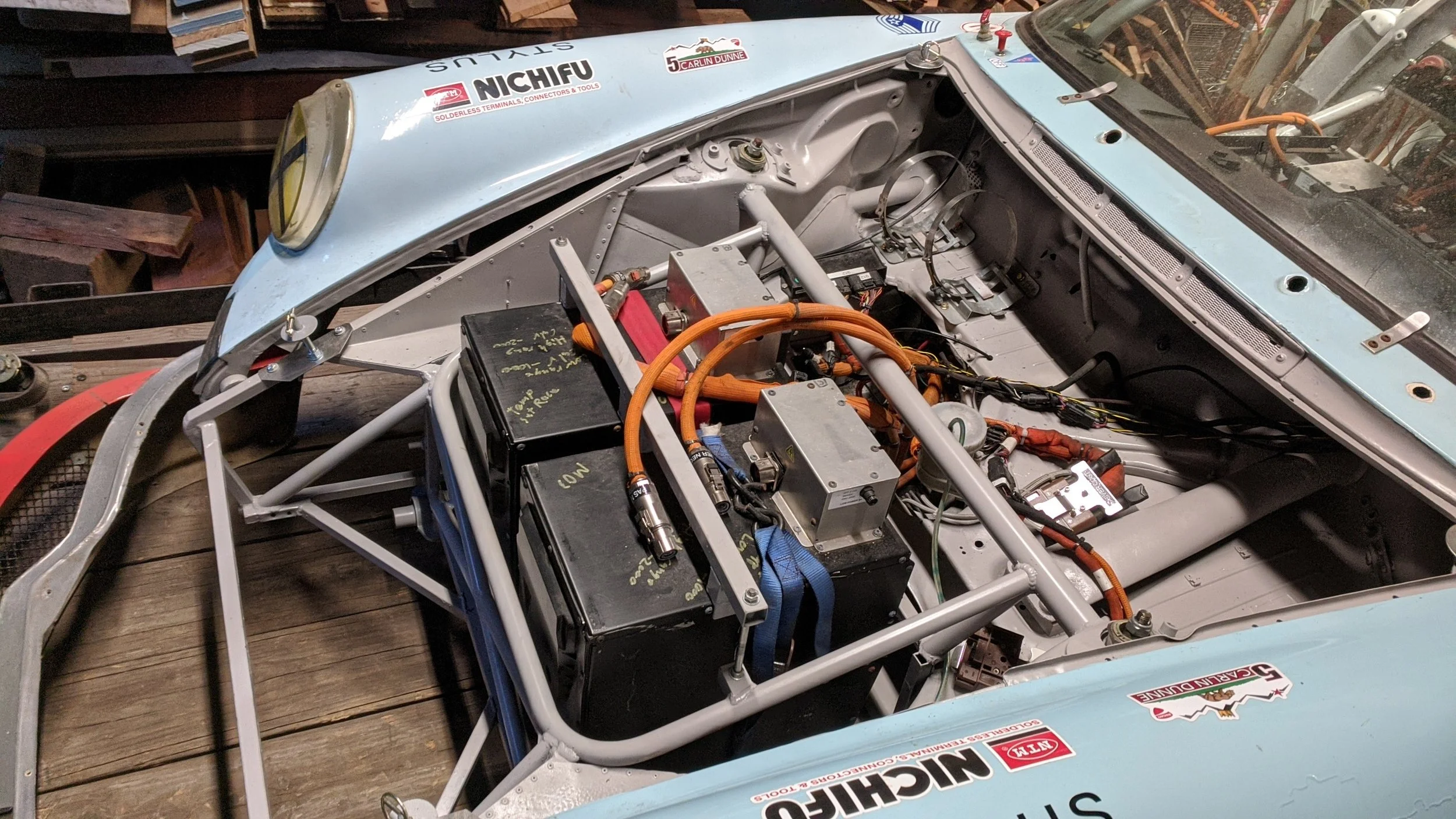 Two Battery Packs Mounted in the Front of the Porsche withing the modern Tube Frame components
