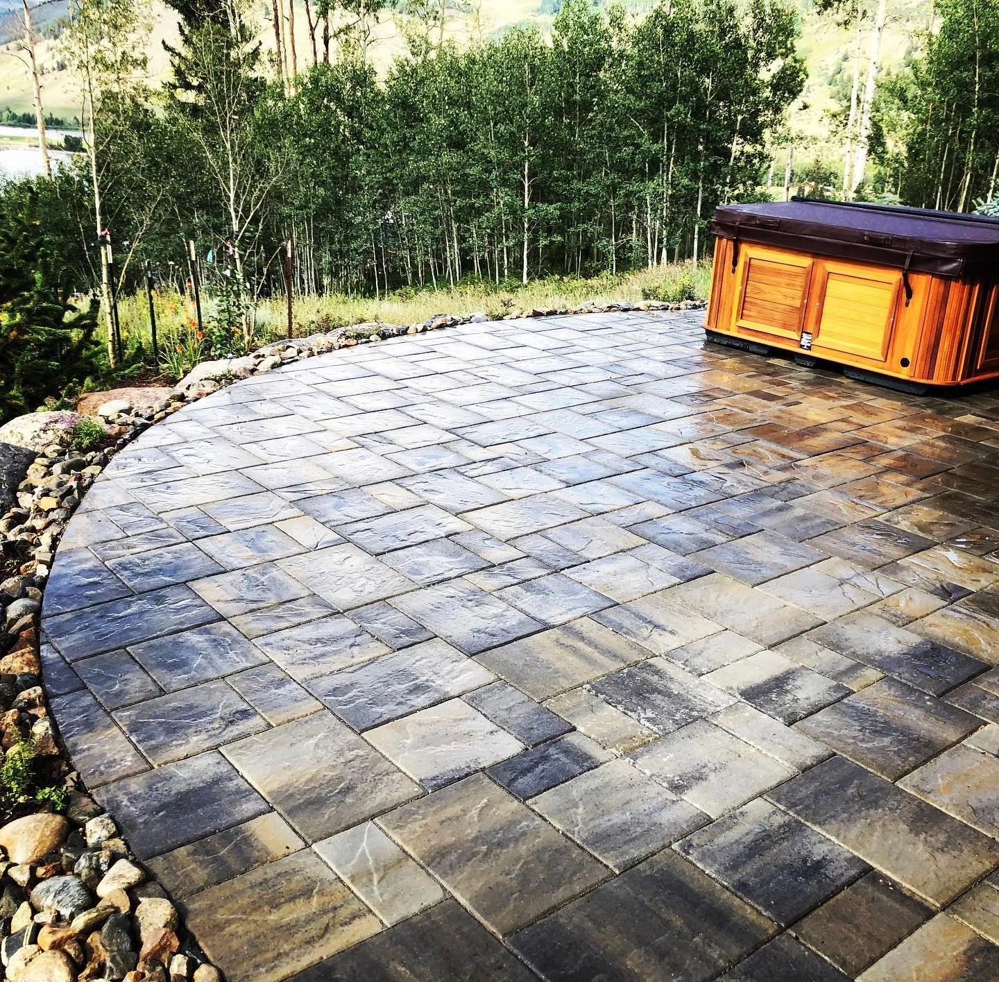 Hot tub + aspens + mountain views = our kind of paradise. 
#patioinstallation 
#newpatio #paverpatio