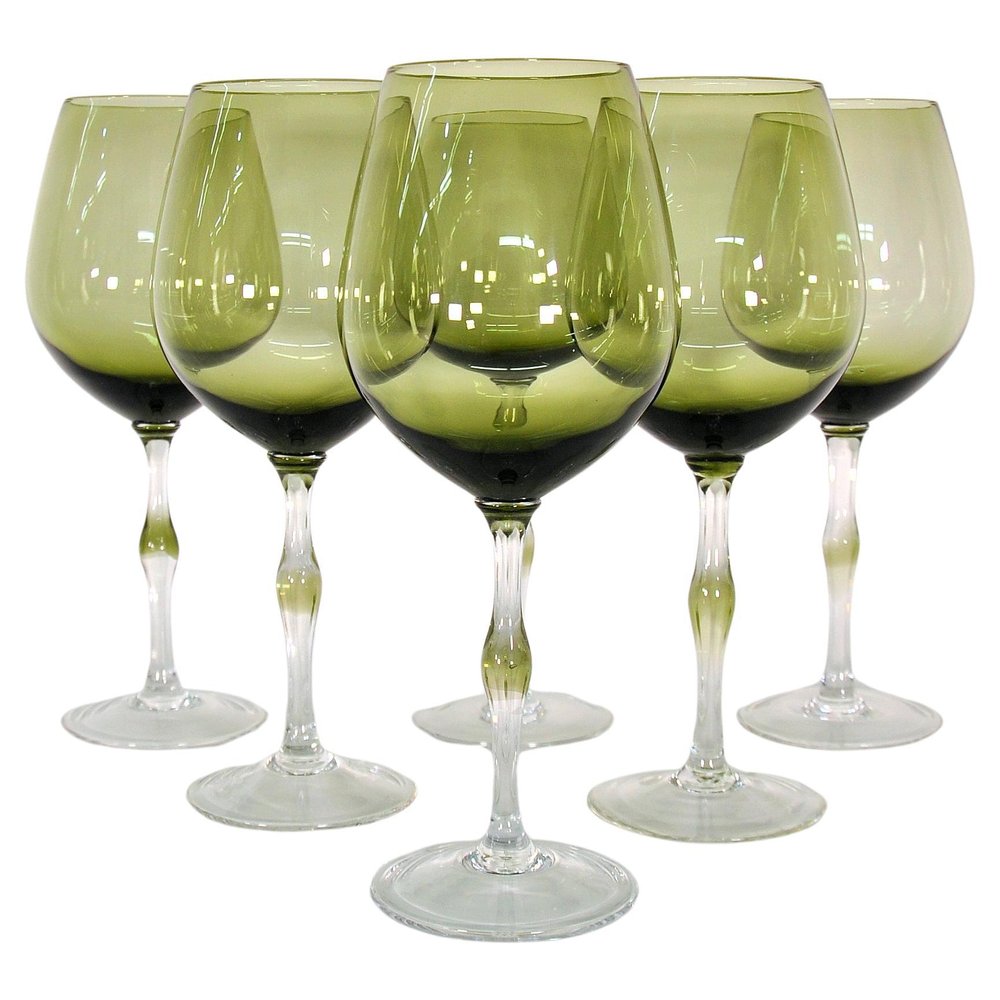 https://images.squarespace-cdn.com/content/v1/628d2996179c184bf054fc91/1687555766451-4A3JG2MZQHPDKN80N5MZ/Olive-Green-Italian-Hand-Blown-Wine-Glasses-1.jpeg?format=1000w