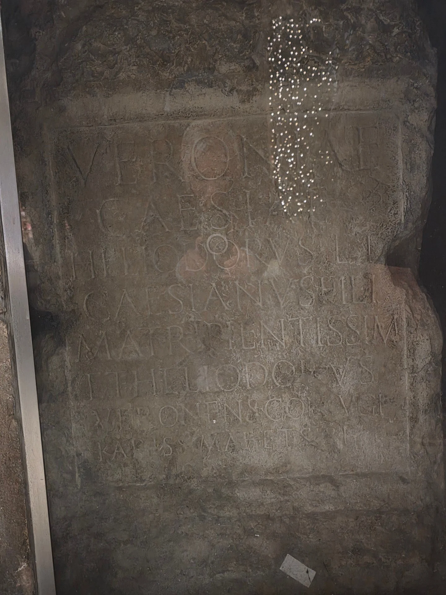 There is something powerful about seeing a woman&rsquo;s name carved in stone centuries ago.

This preserved tomb, protected within a modern building, reflects something Italy does beautifully&mdash;integrating history into everyday life rather than 