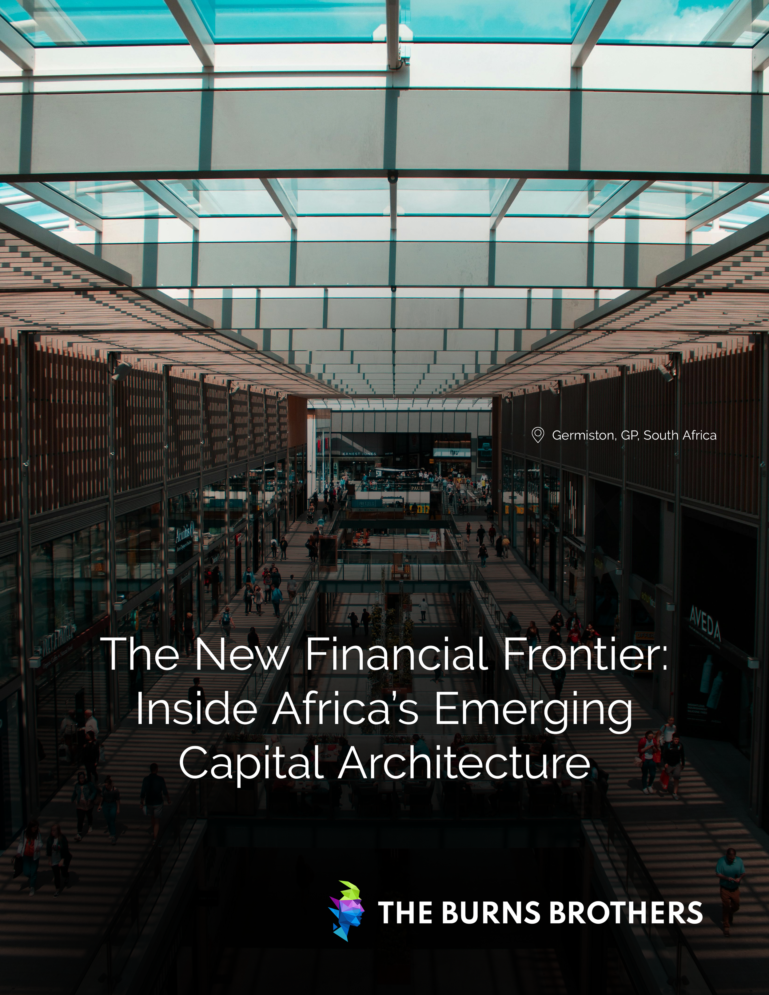 Interior view of a modern shopping mall with high glass ceiling and multiple levels of stores and visitors, located in Germiston, GP, South Africa.