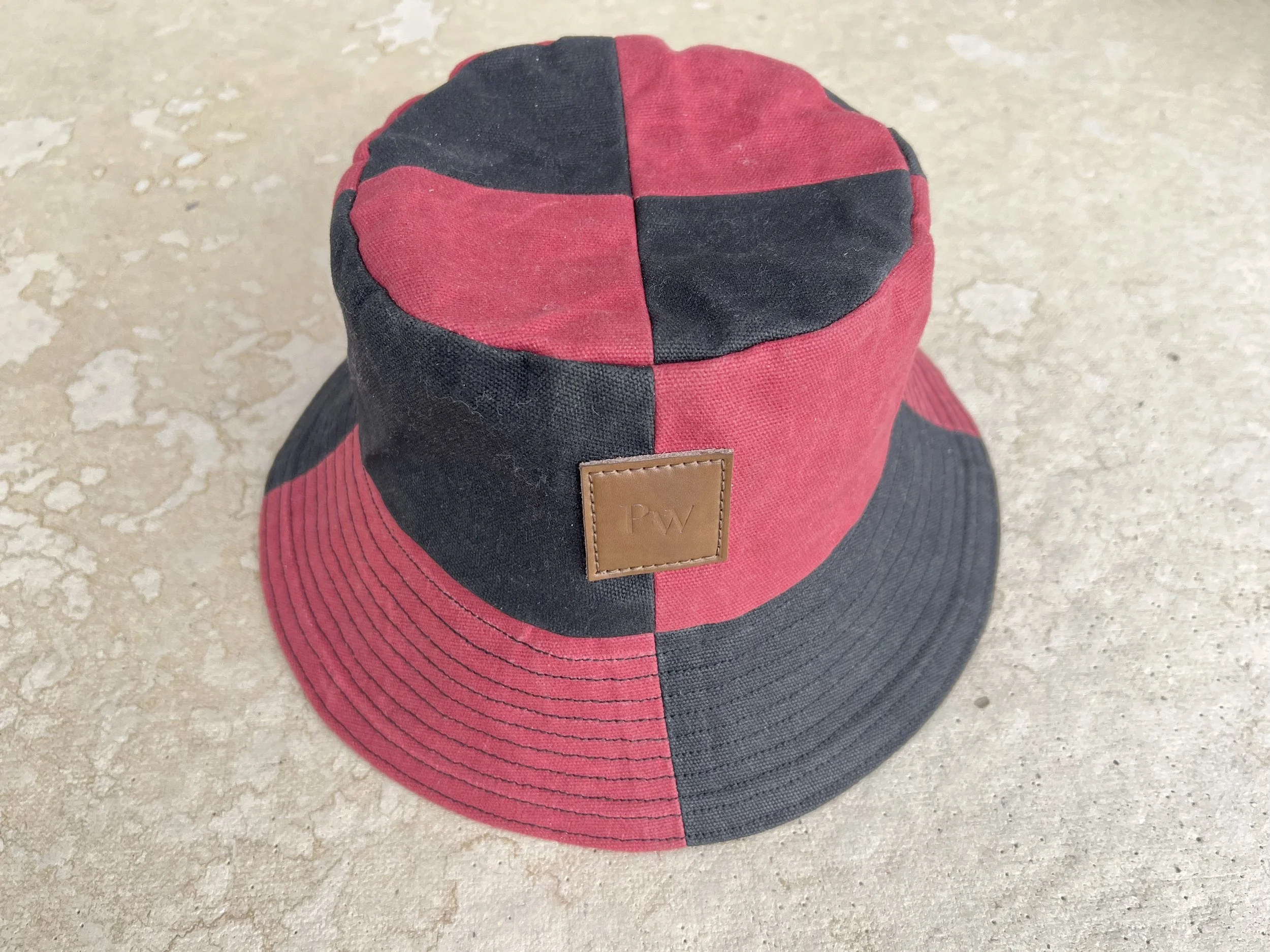 Duel tone bucket hat patch worked into 4 sections alternating red and black