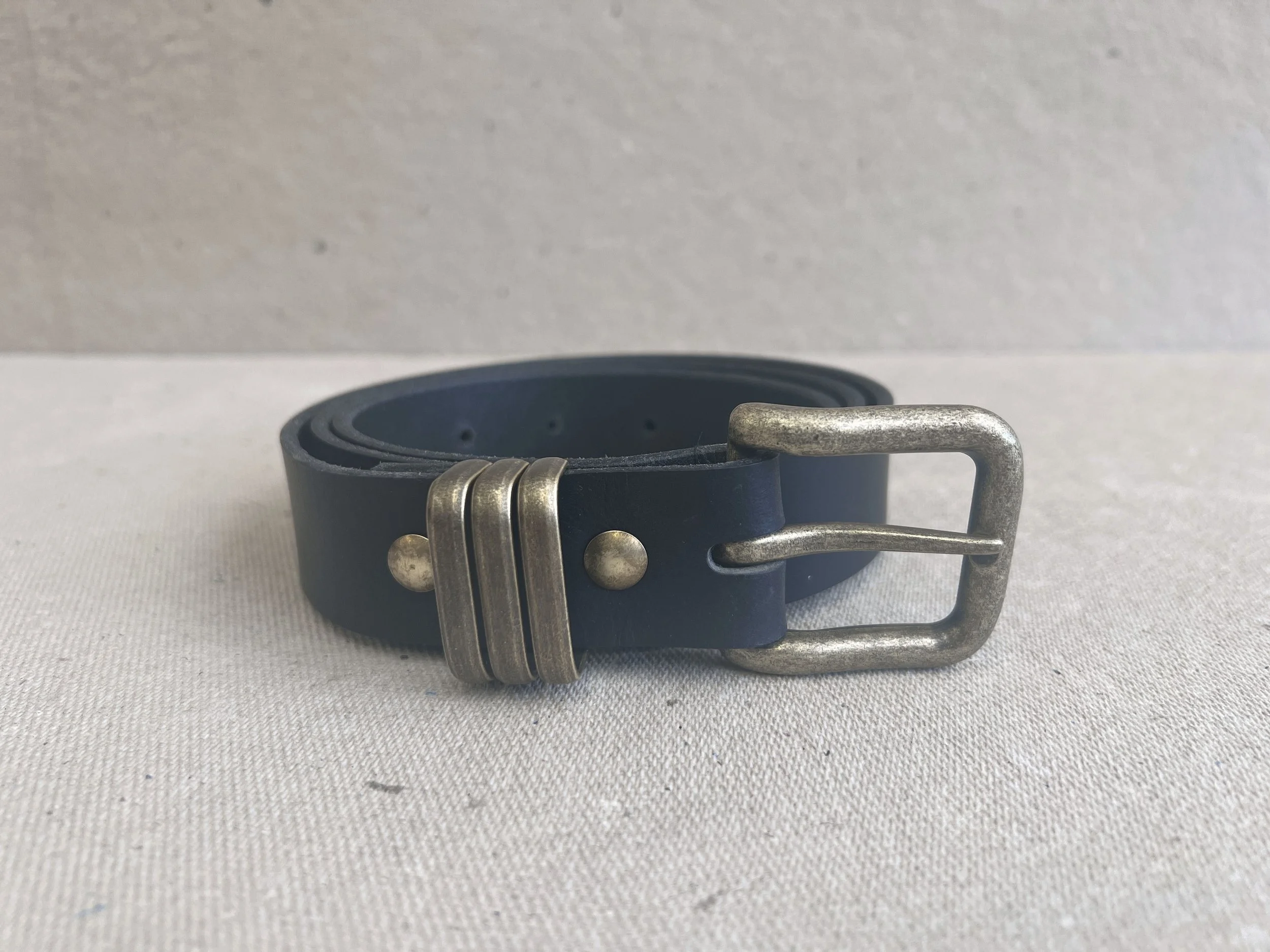 black and antique gold hardware belt