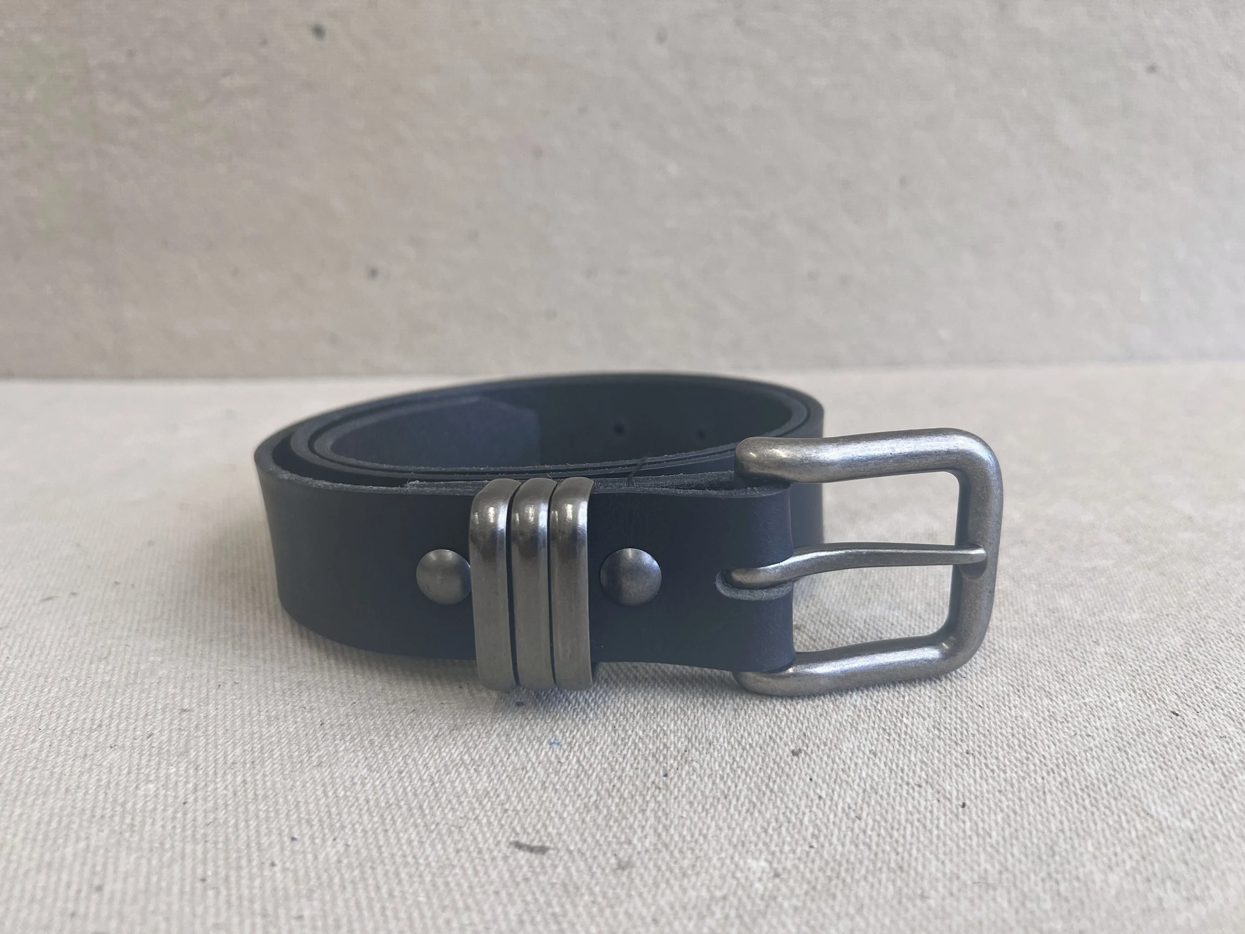 black and antique silver hardware belt