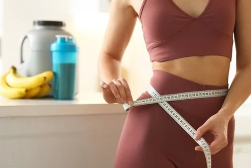 woman showing weight loss progress from medial glp 1