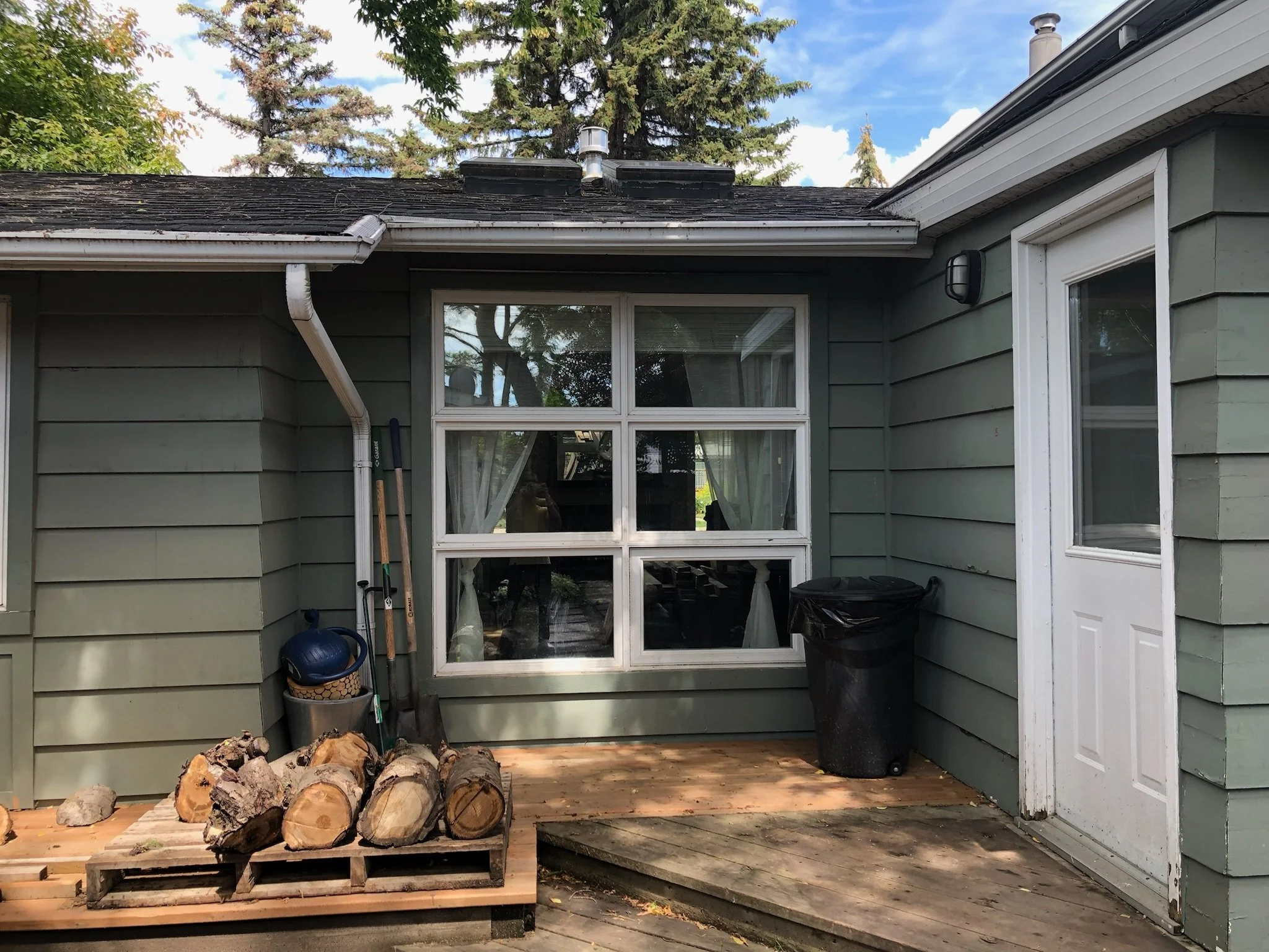 Pre-Renovation Black Sea-Can inspired Home Side.JPG