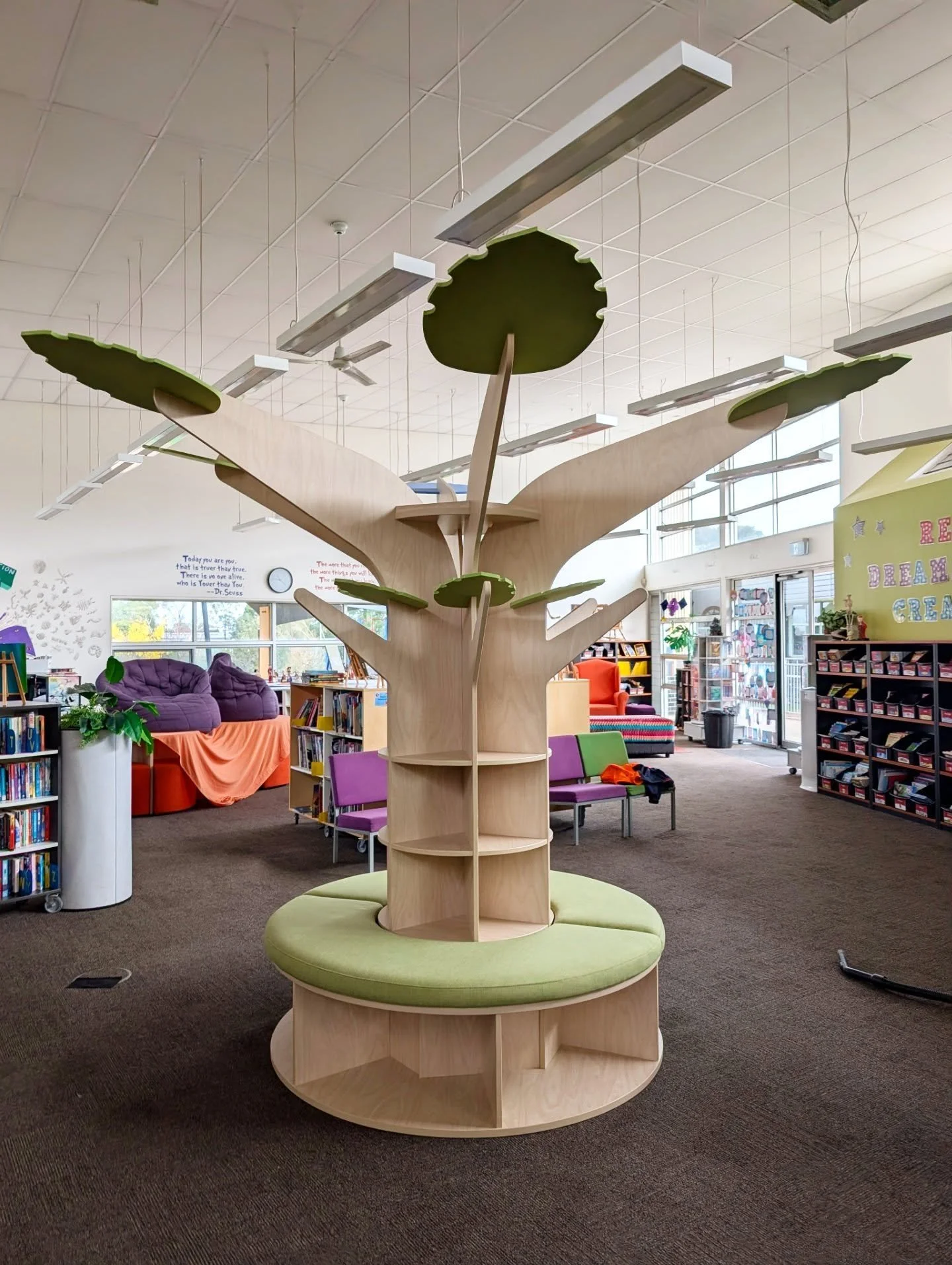 Installed this school library tree I designed as the central feature piece for the space.

Something to move around and sit on, not just another set of shelves. A place for the kids to gather.

Shelving set at different heights, with seating built in