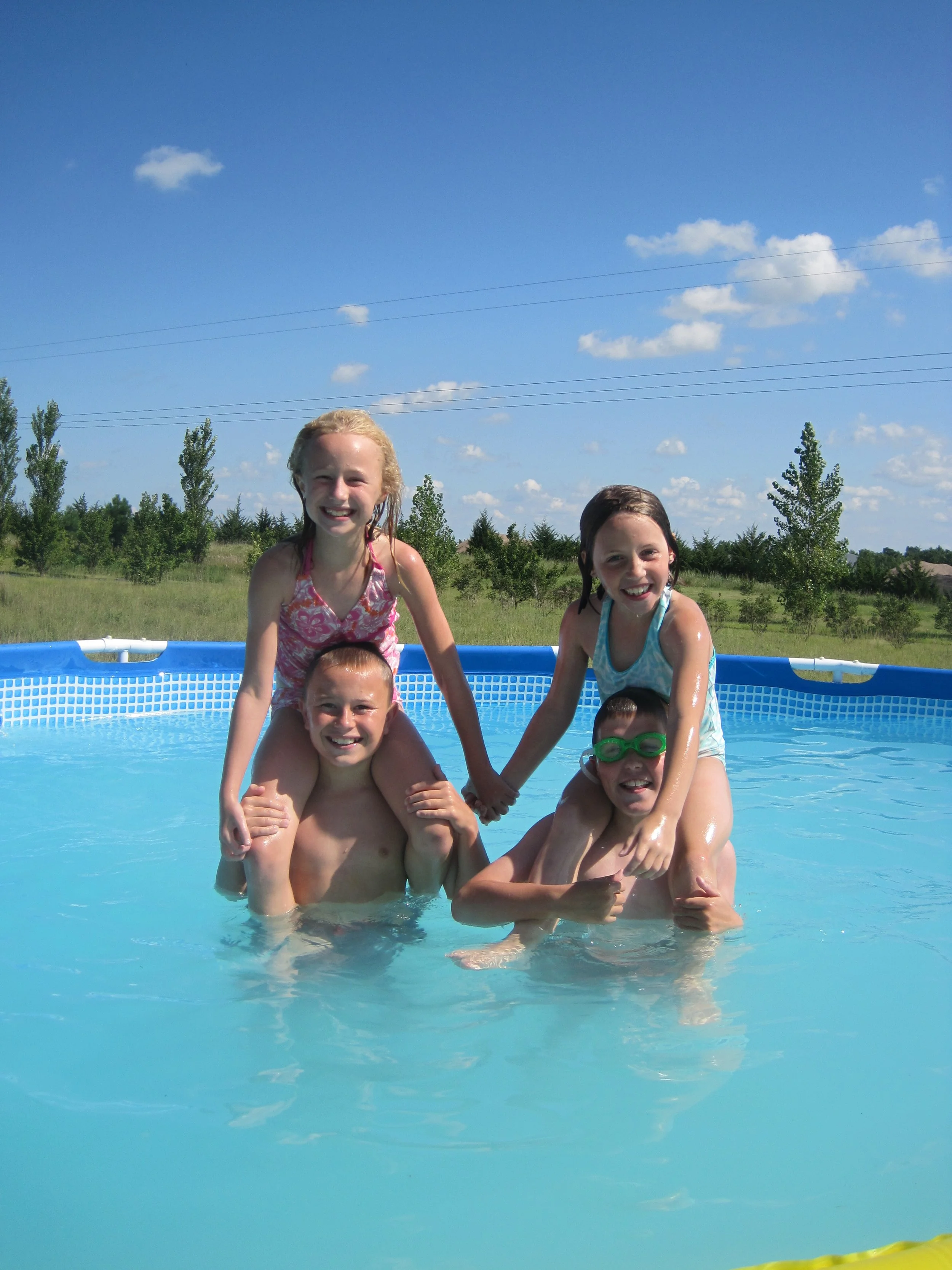 cousins in pool.JPG