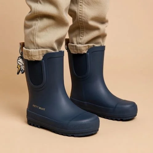 PRETTY-BRAVE-AW26-Big-Kids-Puddle-Boot-Indigo-Campaign-1-WEB-JPG.jpg