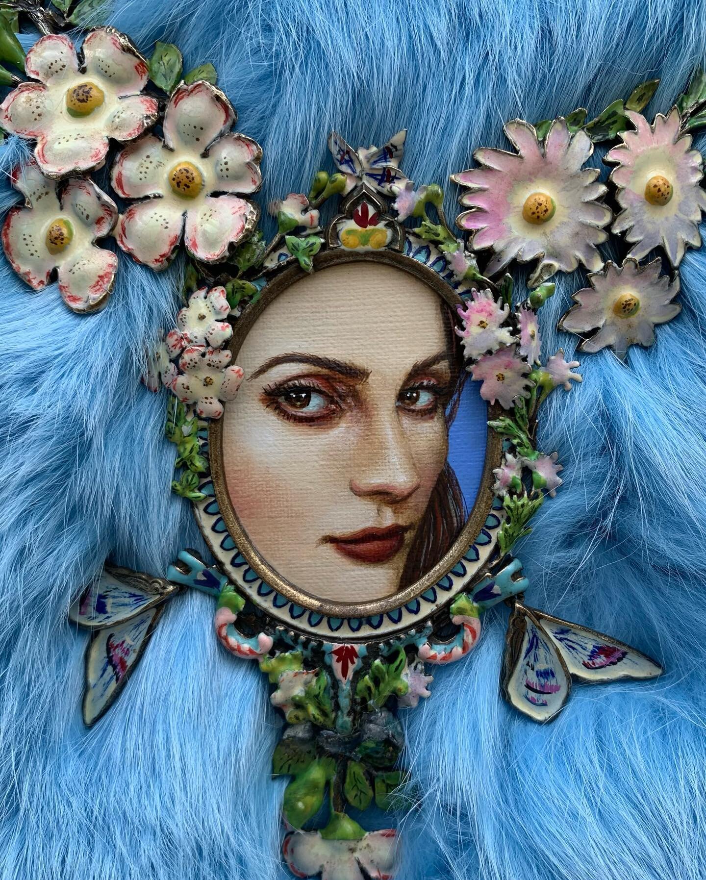 &ldquo;Janan&rdquo;

A portrait of my mother. Set inside a vintage Christian Dior frame necklace. Haute Couture by John Galliano circa early 2000&rsquo;s. Enameled fauna and clipped butterfly wings adorn the frame with decorative floral motifs. Paint