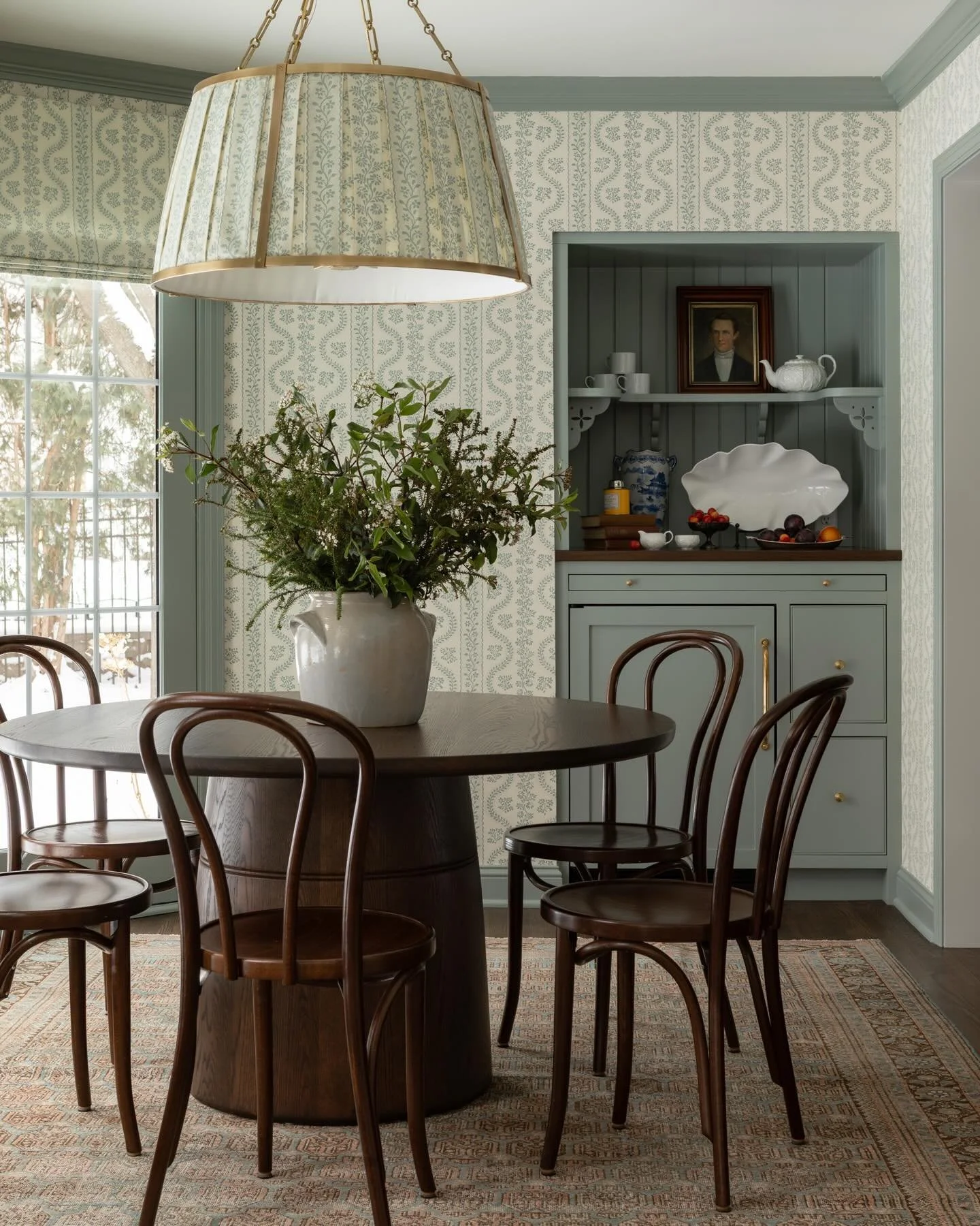 See! We told you we were working on a room that was totally pattern-drenched. It&rsquo;s here! Wallpaper, custom window treatments and pendant shade are all in the Dolly print by Sister Parish. This helped give the room a sense of place within the la