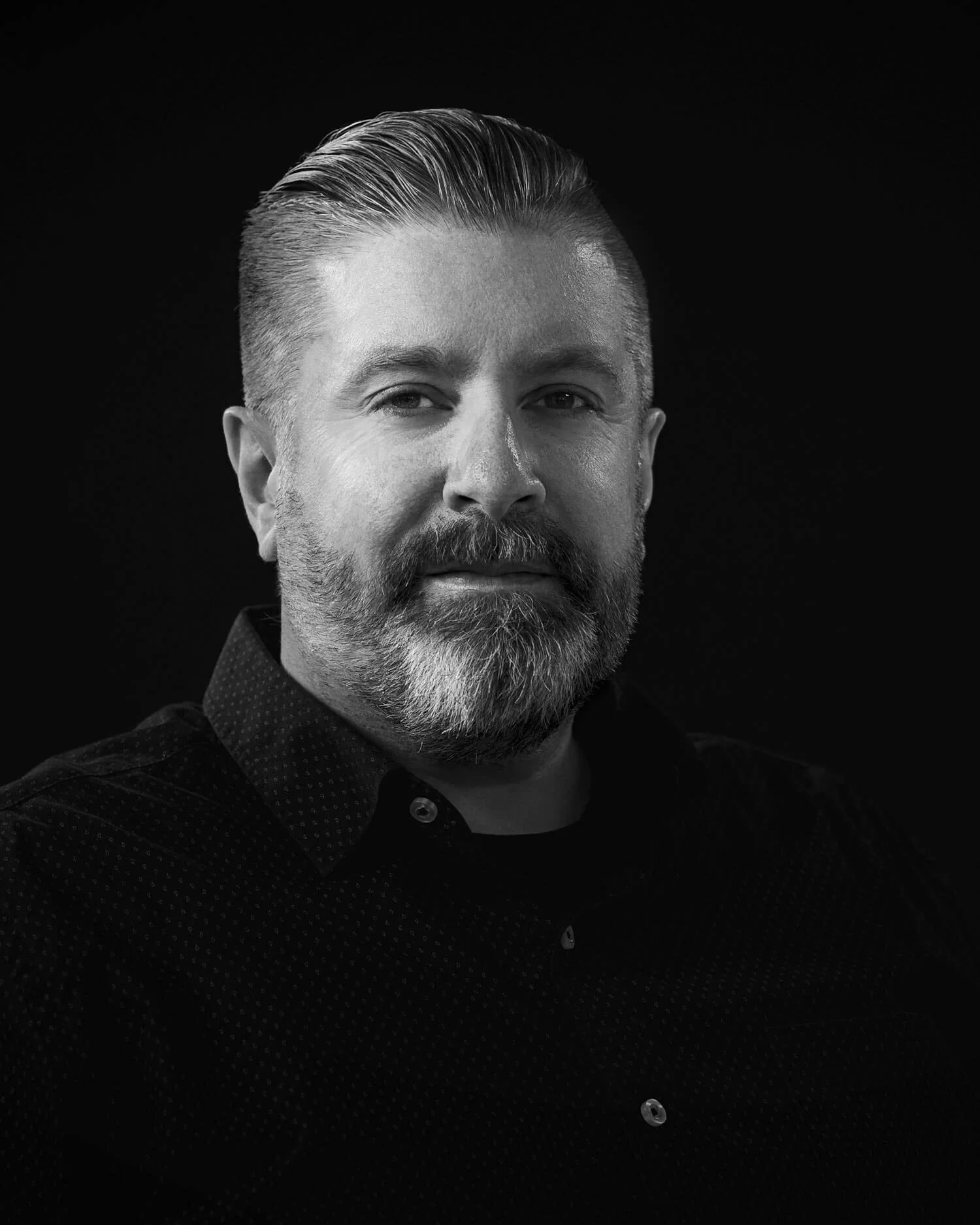 A black and white portrait of Jan Thomas Pettersen