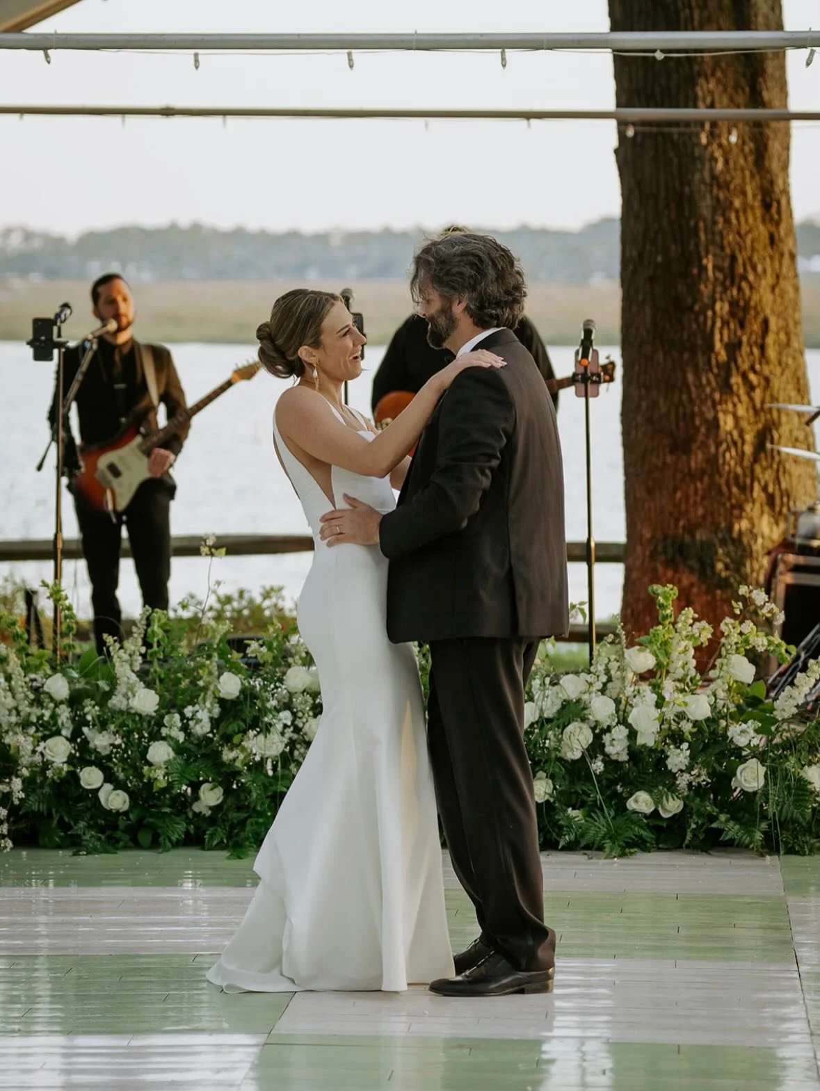What a stunning lowcountry day and a stunning couple! Happy Anniversary to Cayla &amp; John! Guests danced the night away under the oaks on one of our favorite dance floors, enjoyed a bourbon bar by the fire &amp; Cayla rocked an amazing fur coat! 🤍
