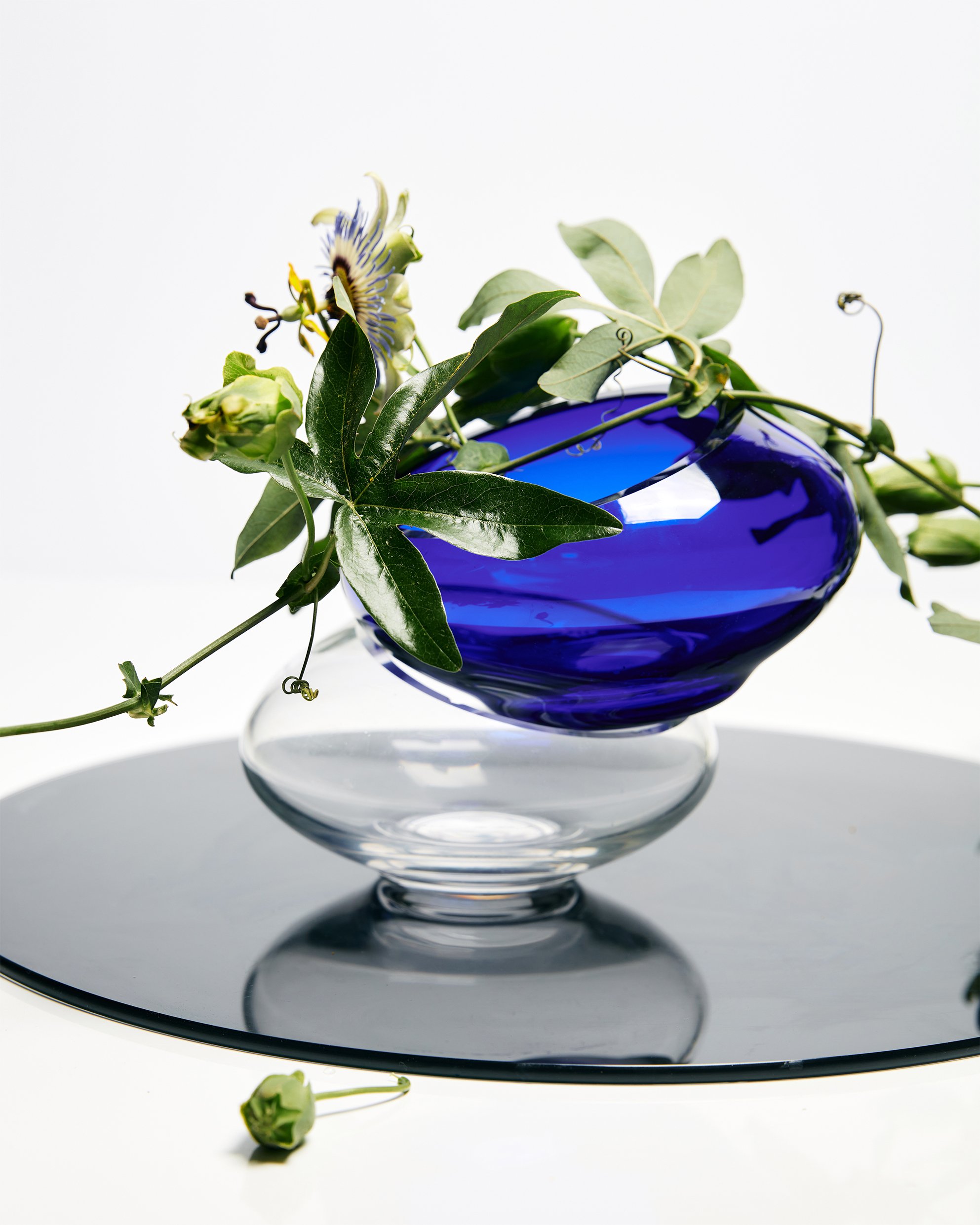 stacking glass bowls with passion flower vines a delicate balance
