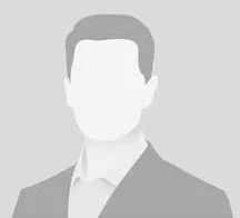 Silhouette of a man in a suit with no facial features.