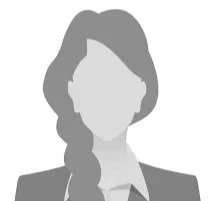 Silhouette of a person with long hair wearing a blazer