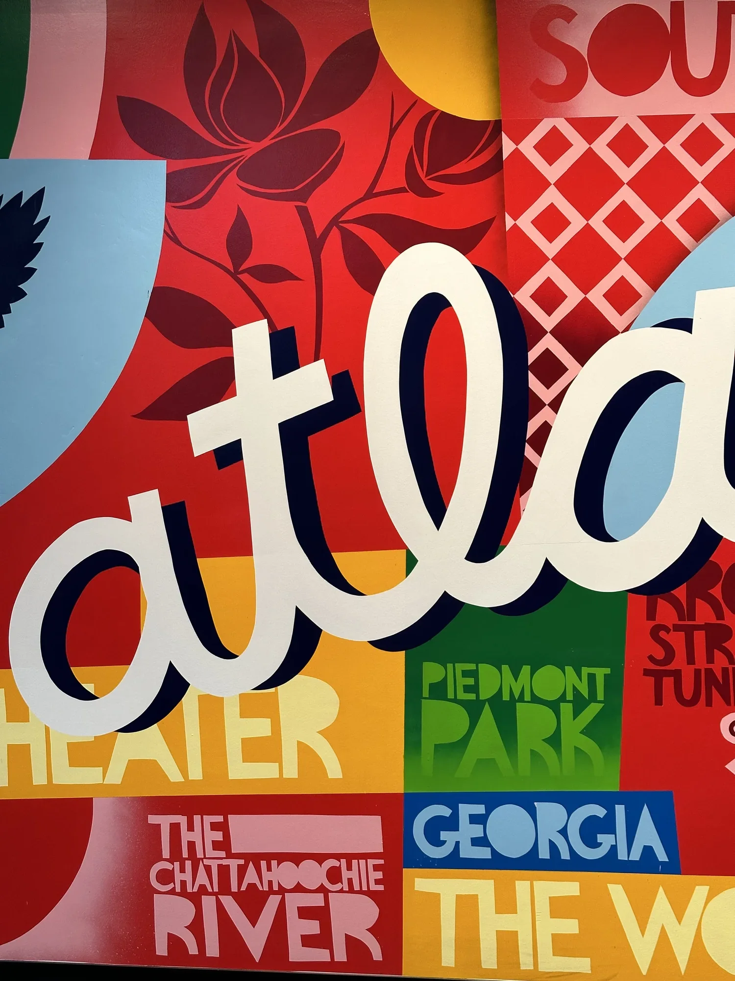 Close up view of Google Fiber mural by John Tindel showcasing Atlanta's history.