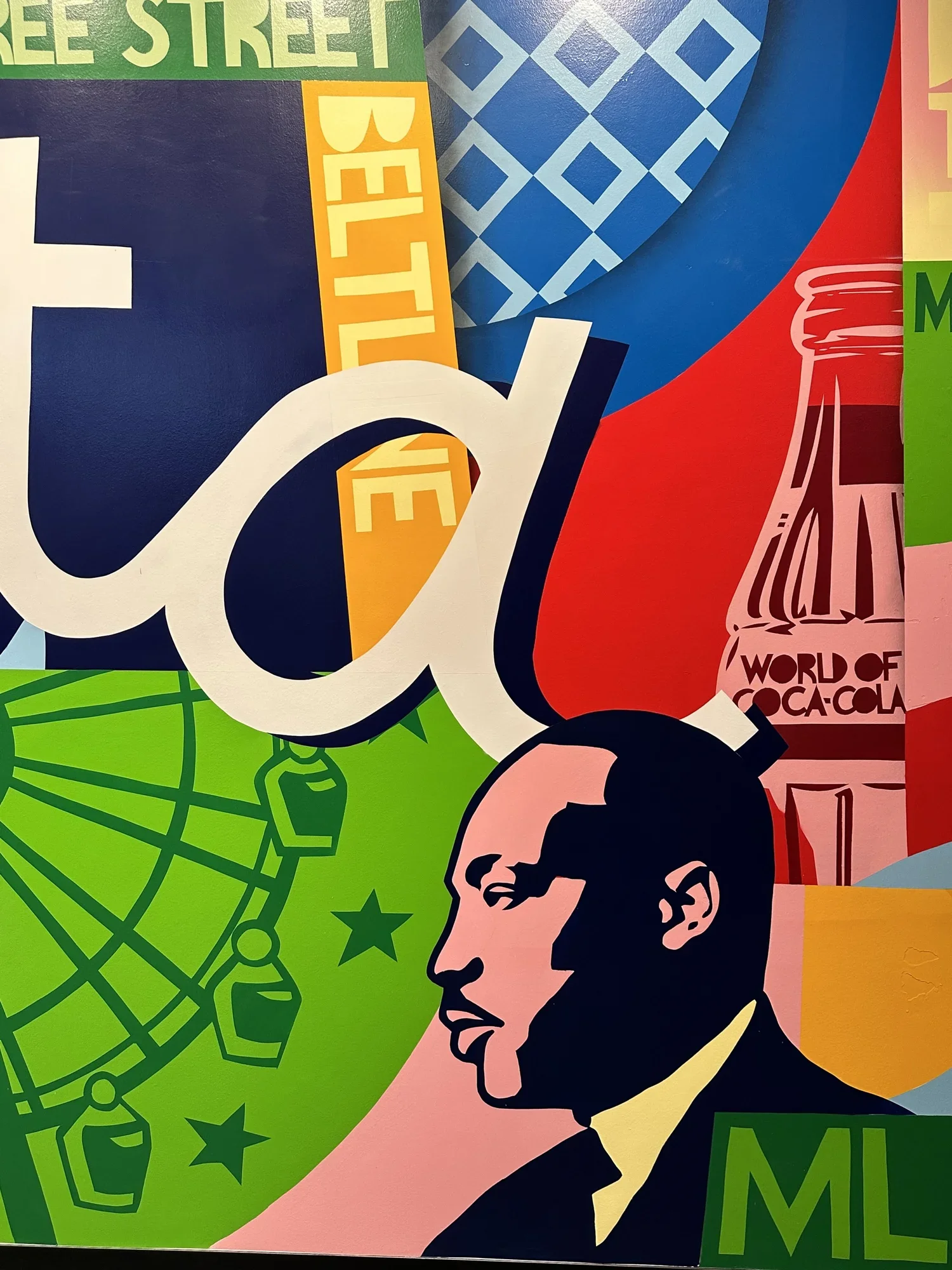 Close up view of Google Fiber mural by John Tindel showcasing Atlanta's history showcasing MLK.