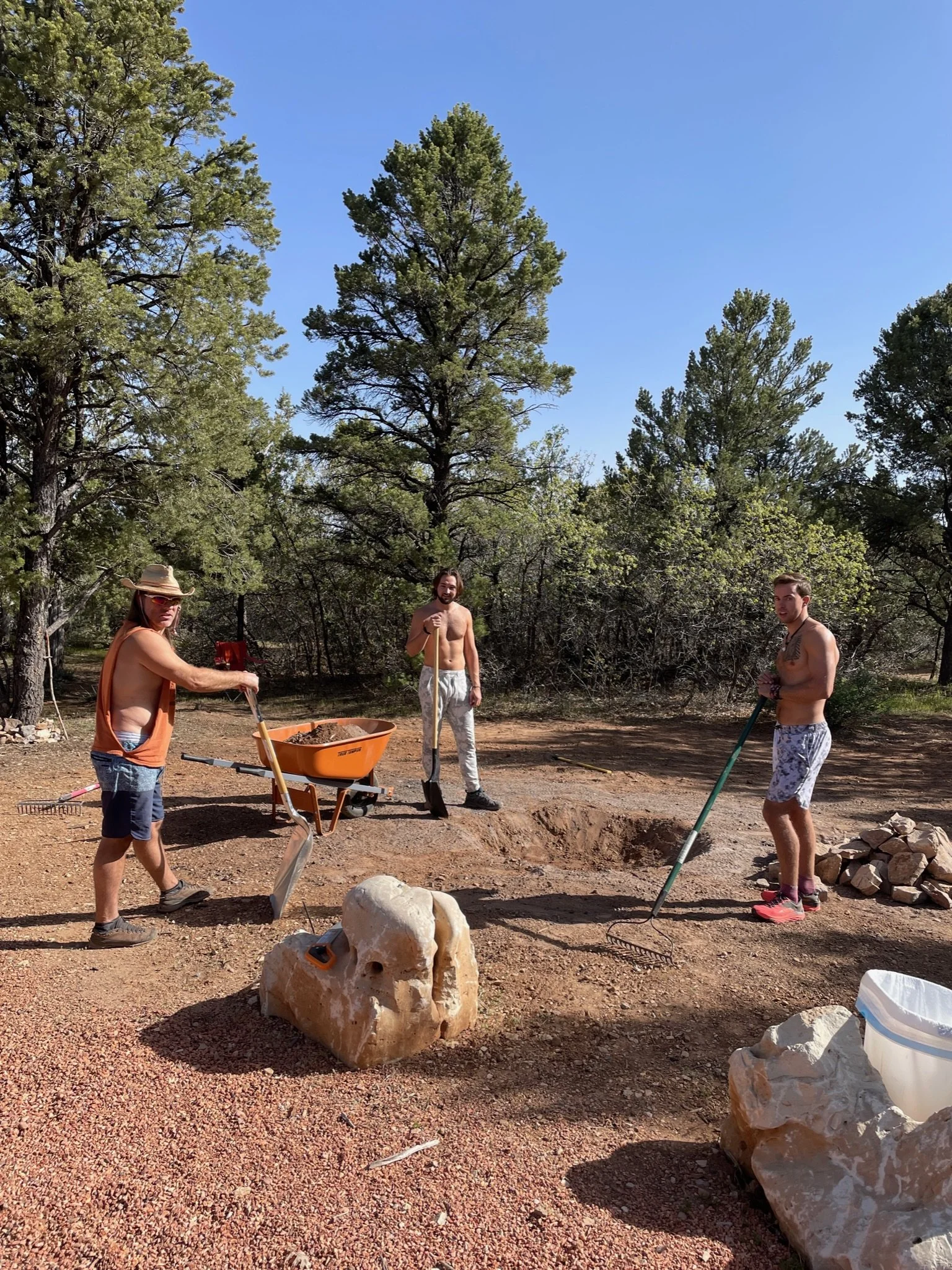HumanNatureYoga encourages you to go outside and try new things. Here, the men are building a fire pit for the group in Zion, Utah at the Revitalize and Harmonize yoga retreat.