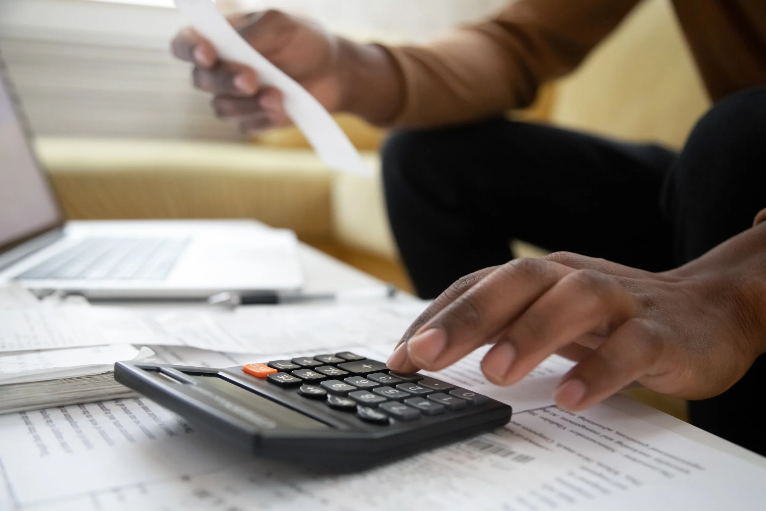 Taxes with calculator.jpg