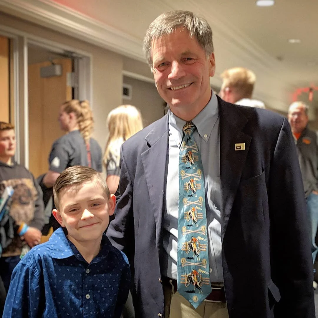 Jason's son Cooper with Governor Mark Gordon