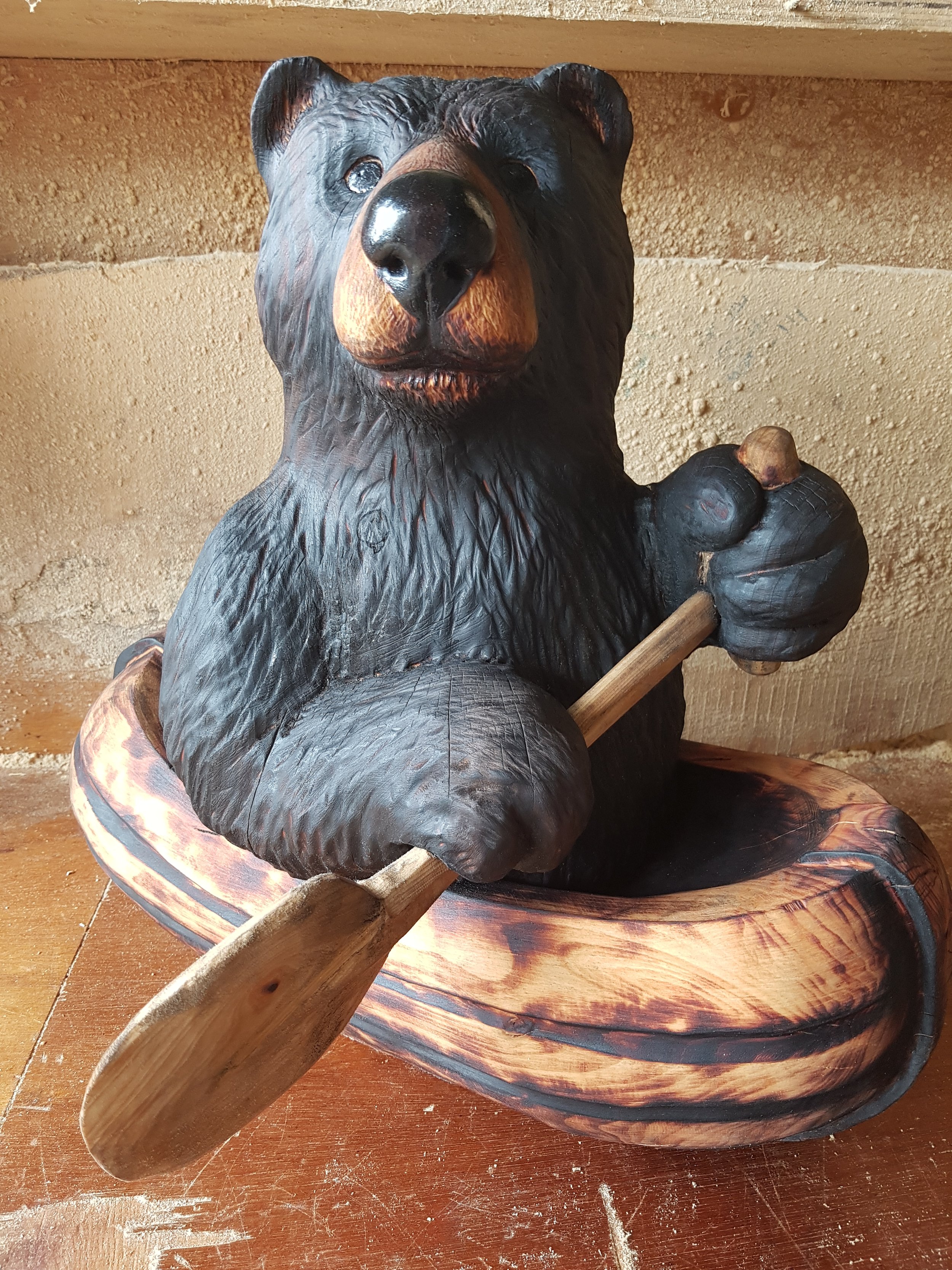 Bear in a boat, spruce and ash