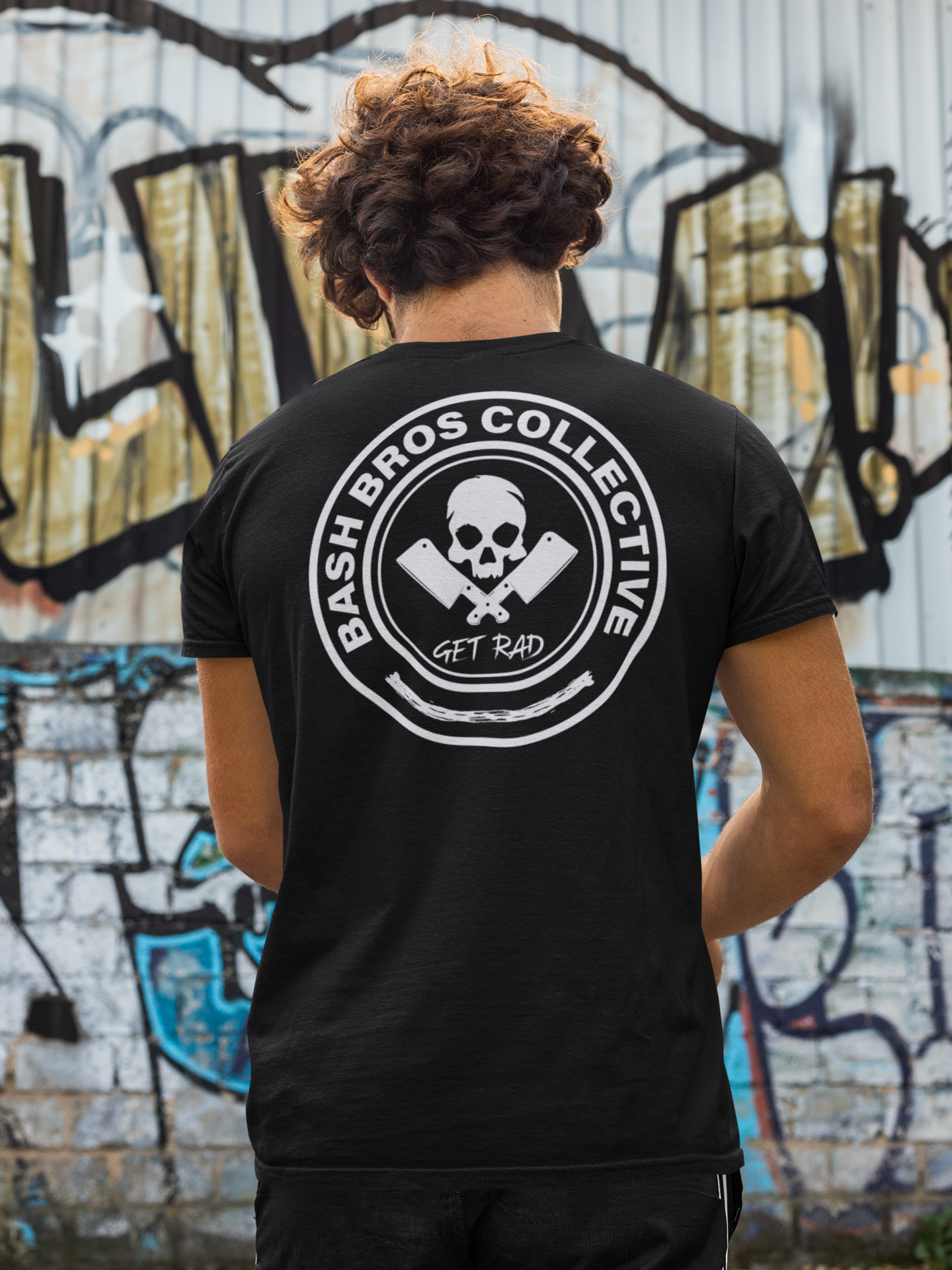 back-view-t-shirt-mockup-of-a-man-in-front-of-a-wall-with-graffiti-m520.png