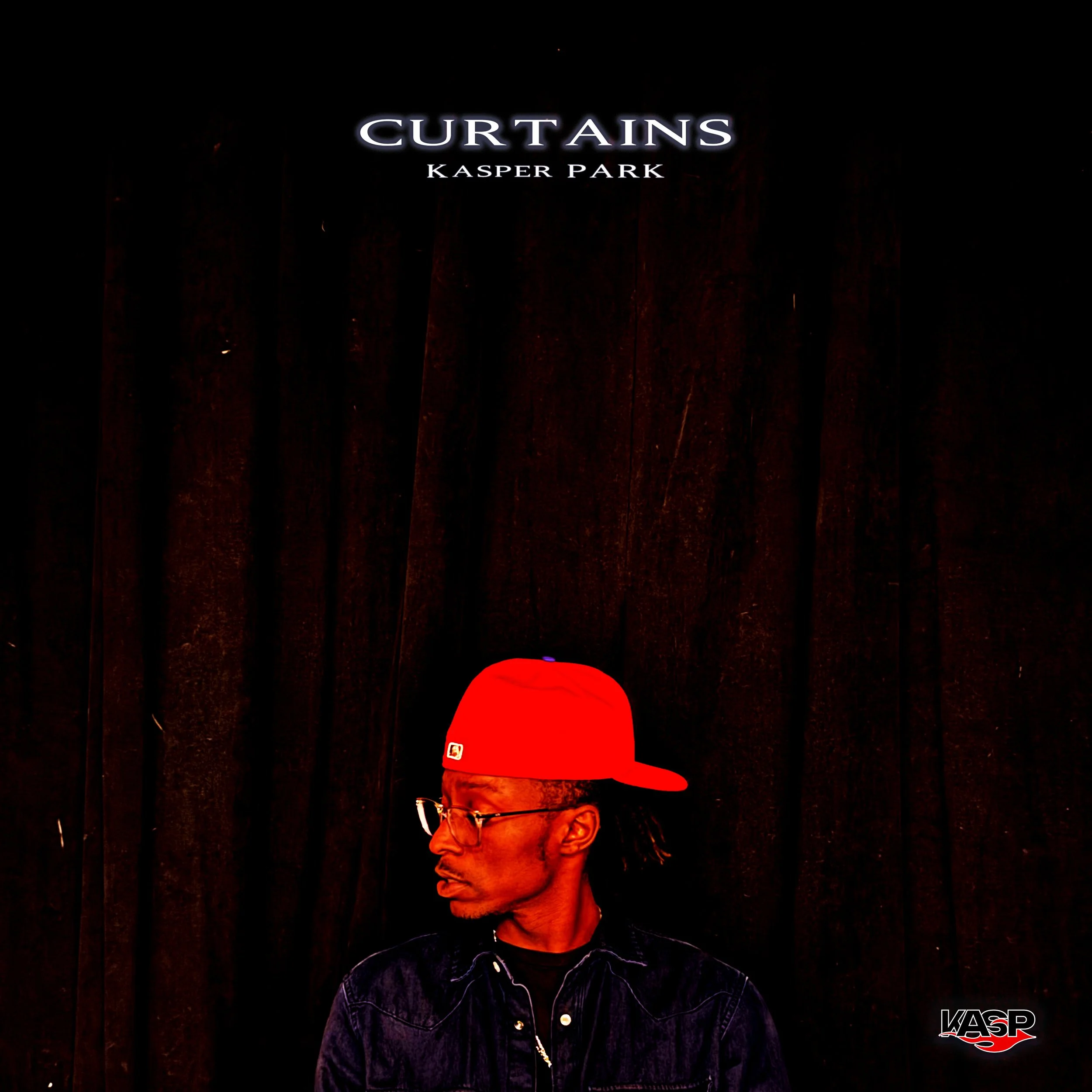 An album cover titled "Curtains" by Kasper Park shows a man wearing a red baseball cap and glasses, looking to the side, against a black background with a dark curtain texture.