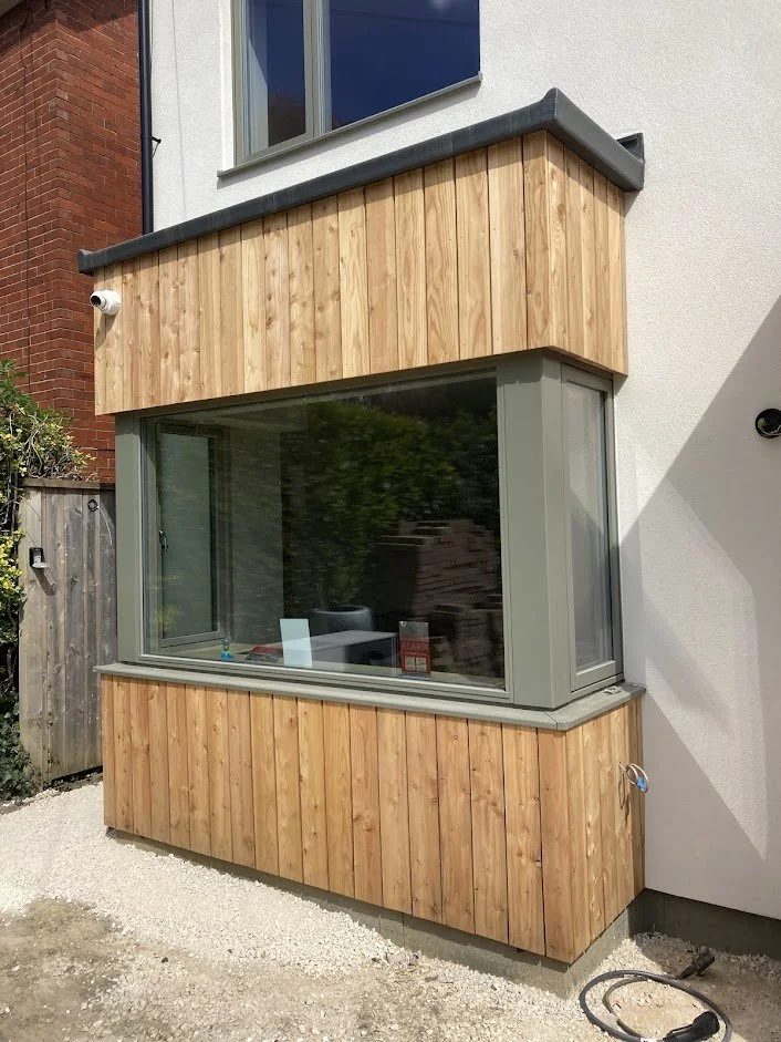 Larch Cladding Glebe Builders 1.jpg