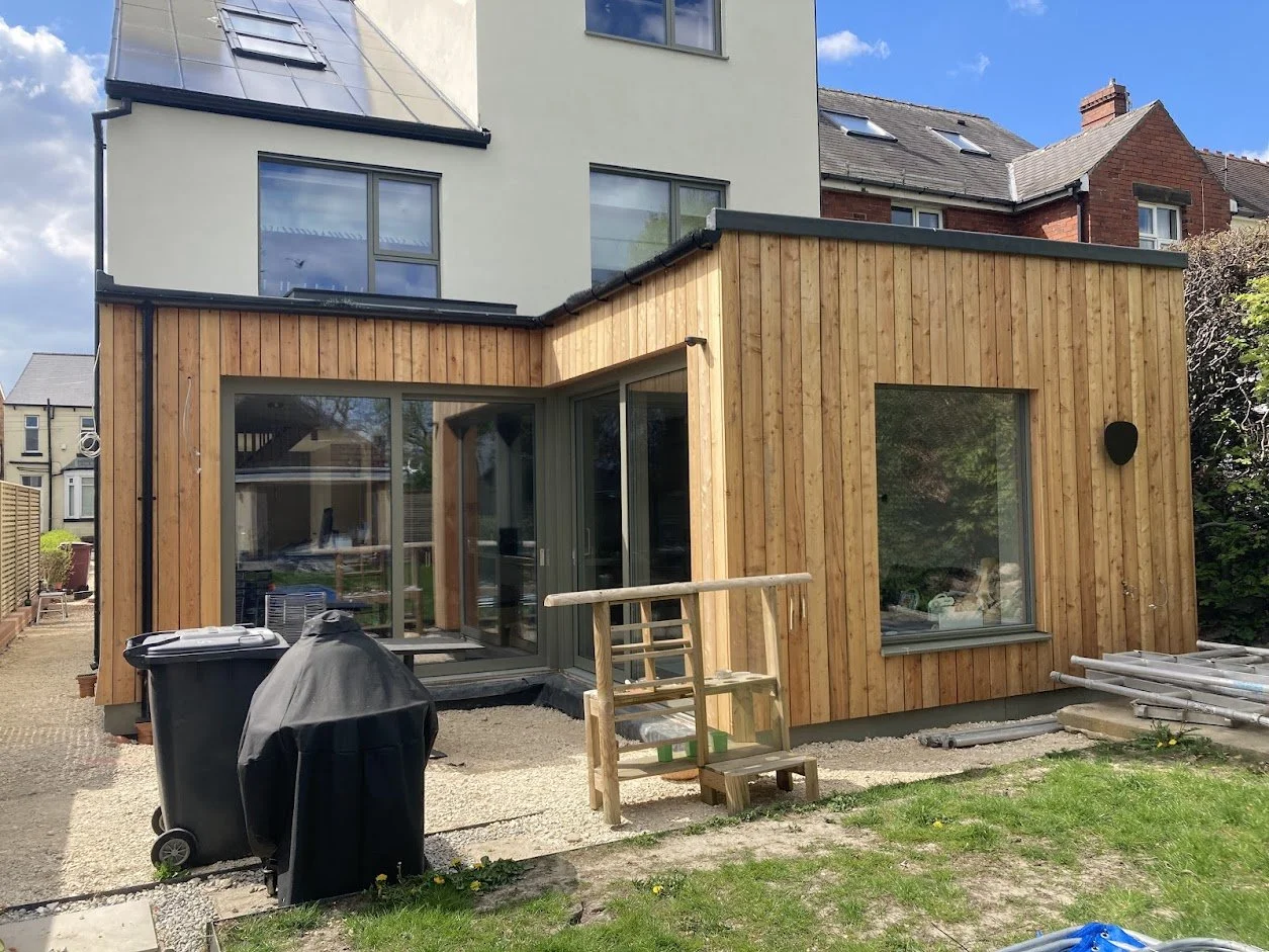 Larch Cladding Glebe Builders 2.jpg