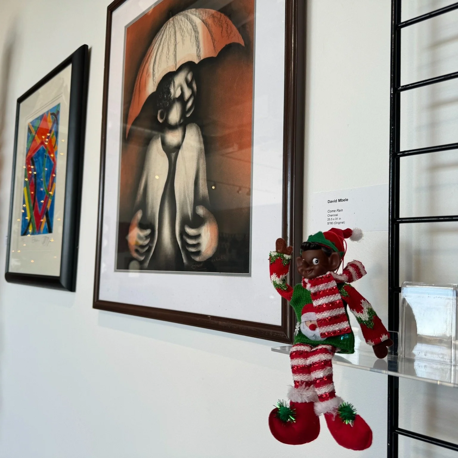 Through the course of Ash&eacute; Holiday Market, Elf on the Shelf highlights the participating artists and their contributions available for purchase at the Community Artists' Collective!

Robbie Lee, founder of Black Heritage Gallery (1977 - 2014),