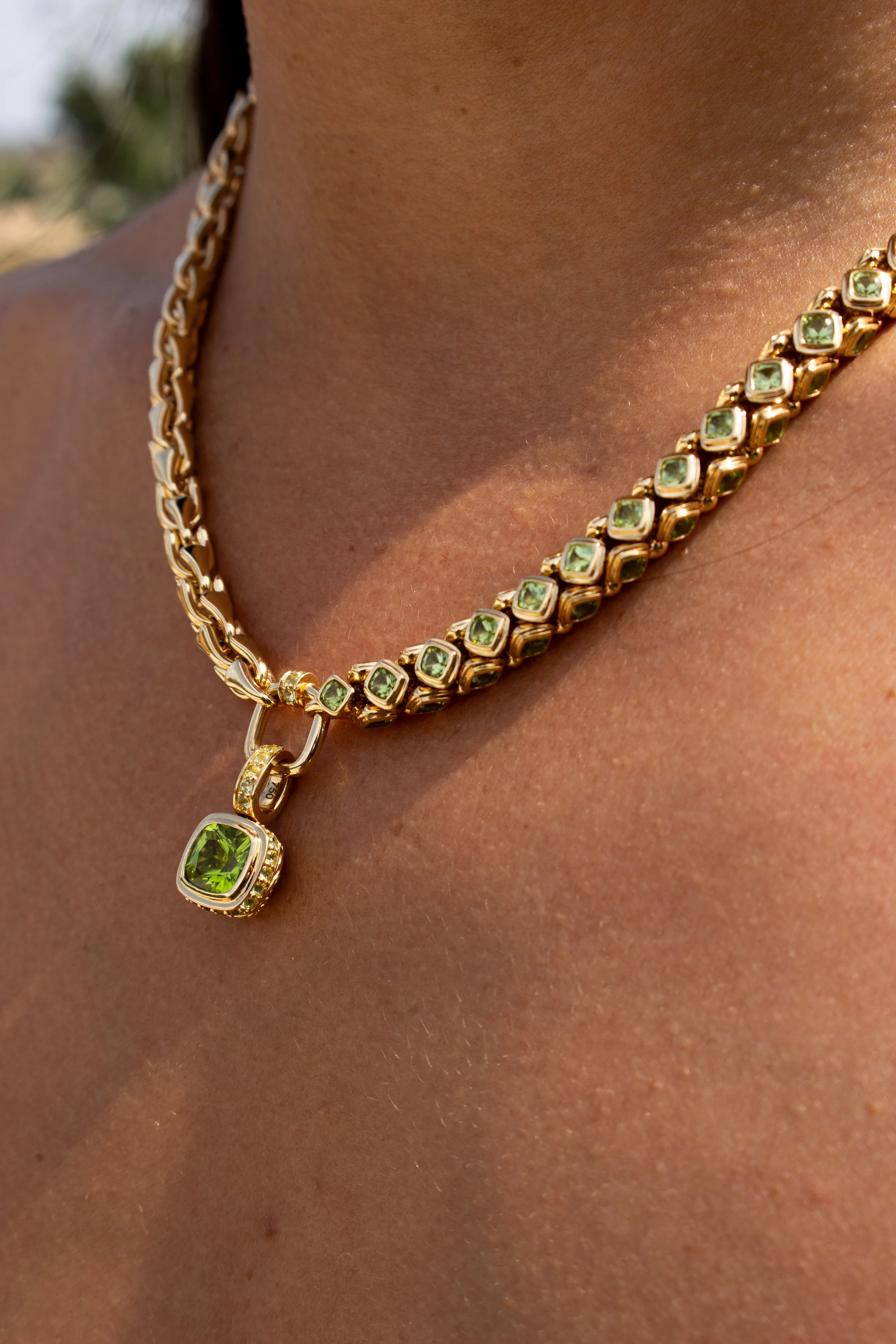 18K Yellow gold award winning necklace design, set with Fuli peridot gemstone by Sophie Cudworth