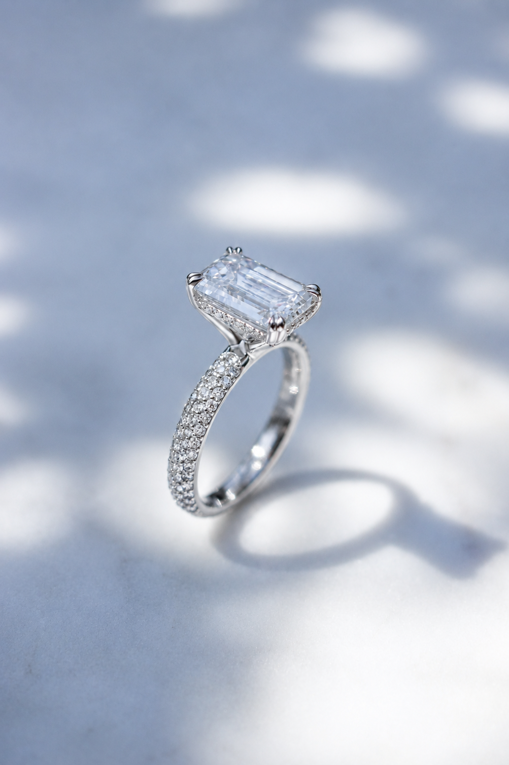 Platinum with 2.37ct natural F VS emerald cut diamond and pave shank by Sophie Cudworth