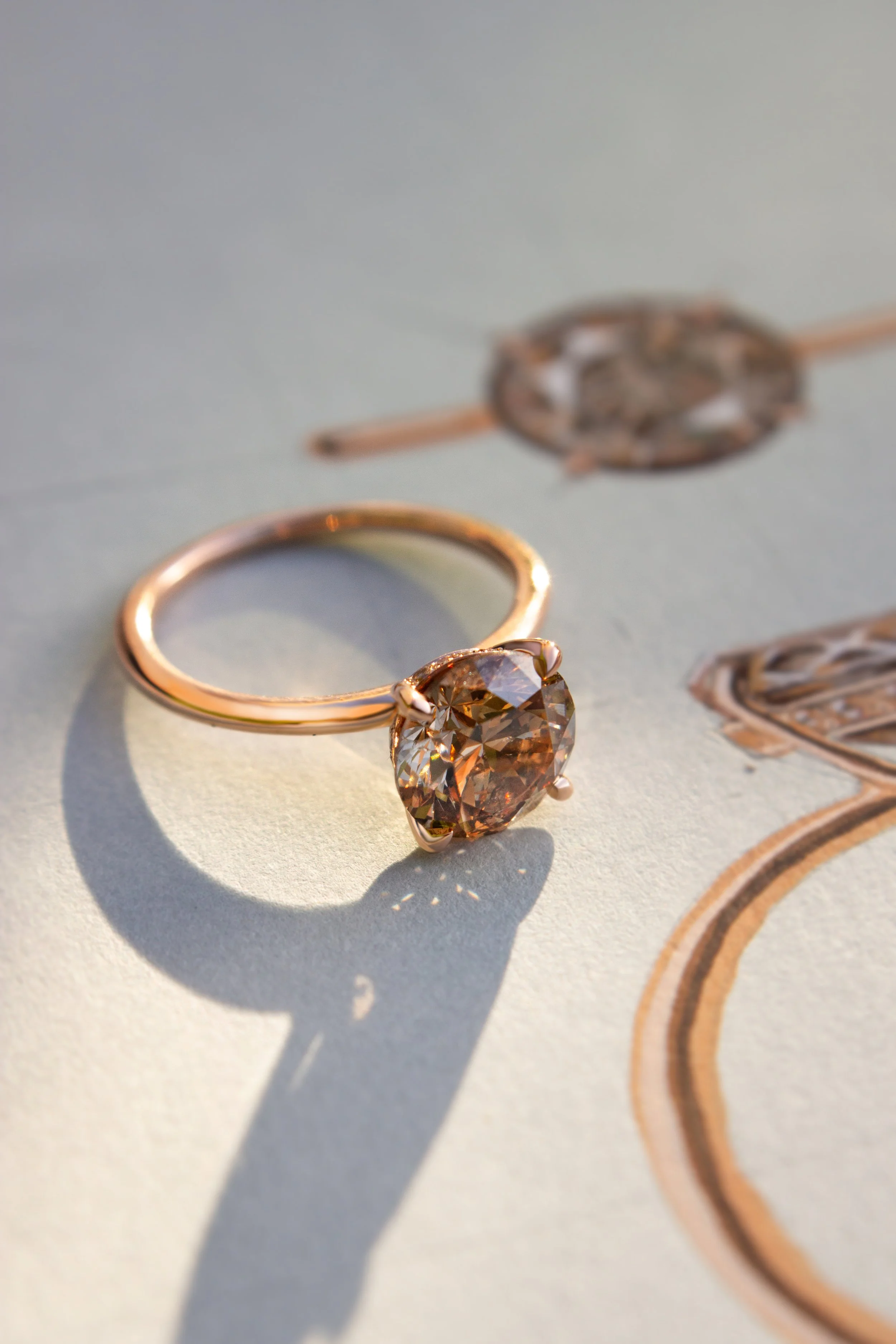 18K rose gold engagement ring by Sophie Cudworth set with a 2.00ct champagne diamond 