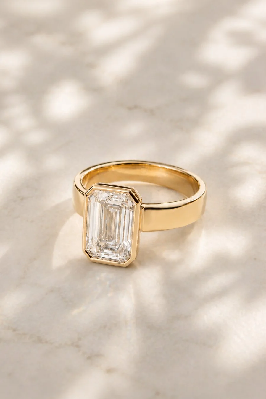 18K recyled gold with 3ct emerald cut diamond by Sophie Cudworth 