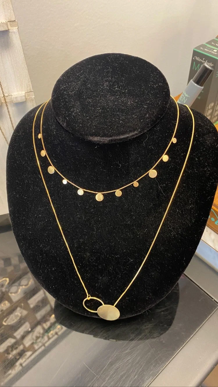 Stacking gold necklaces